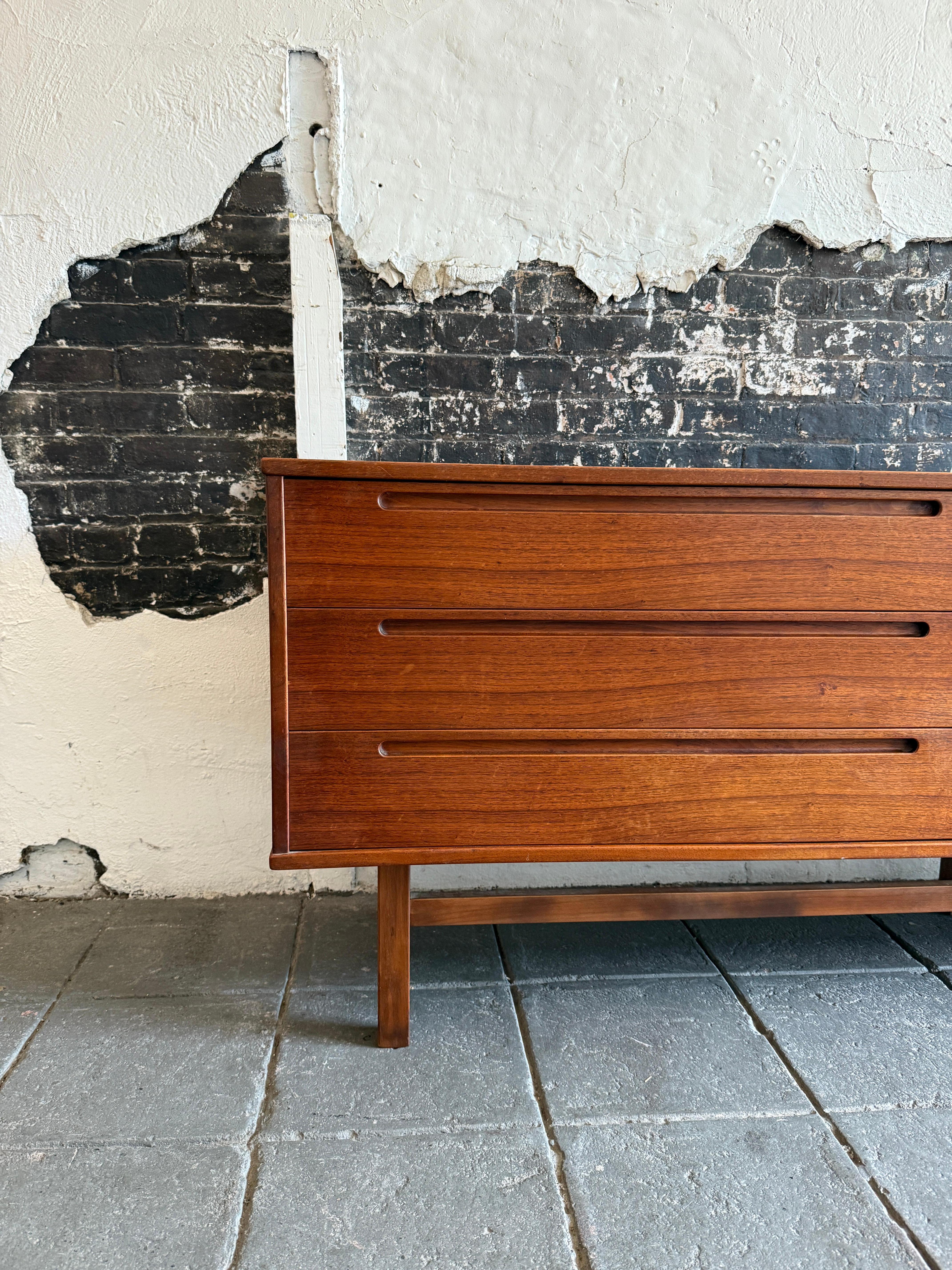 Rare Mid century Danish modern 9 drawer long low dresser or credenza by Nils Jonsson. Danish Mid-Century Modern chest of drawers or credenza in vintage condition. Nice vintage example of simple Danish modernism. Nils Jonsson nine-drawer long low
