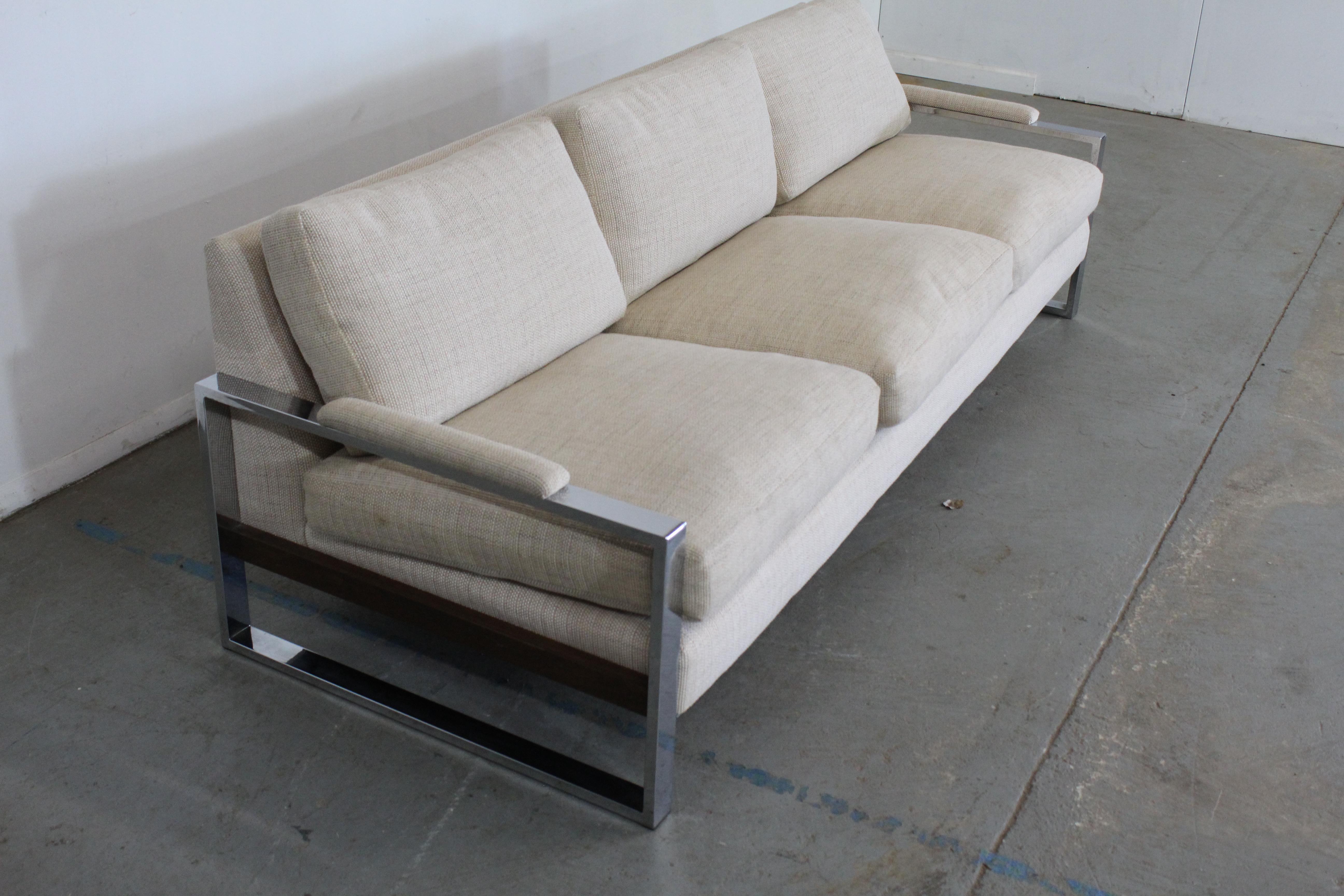 Mid-Century Danish Modern Adrian Pearsall chrome craft associates sofa.

Offered is a gorgeous vintage mid-century modern sofa, By Craft Associates- Adrian Pearsall. Features 3 removable seat and back cushions, and sits on Chrome and a Walnut