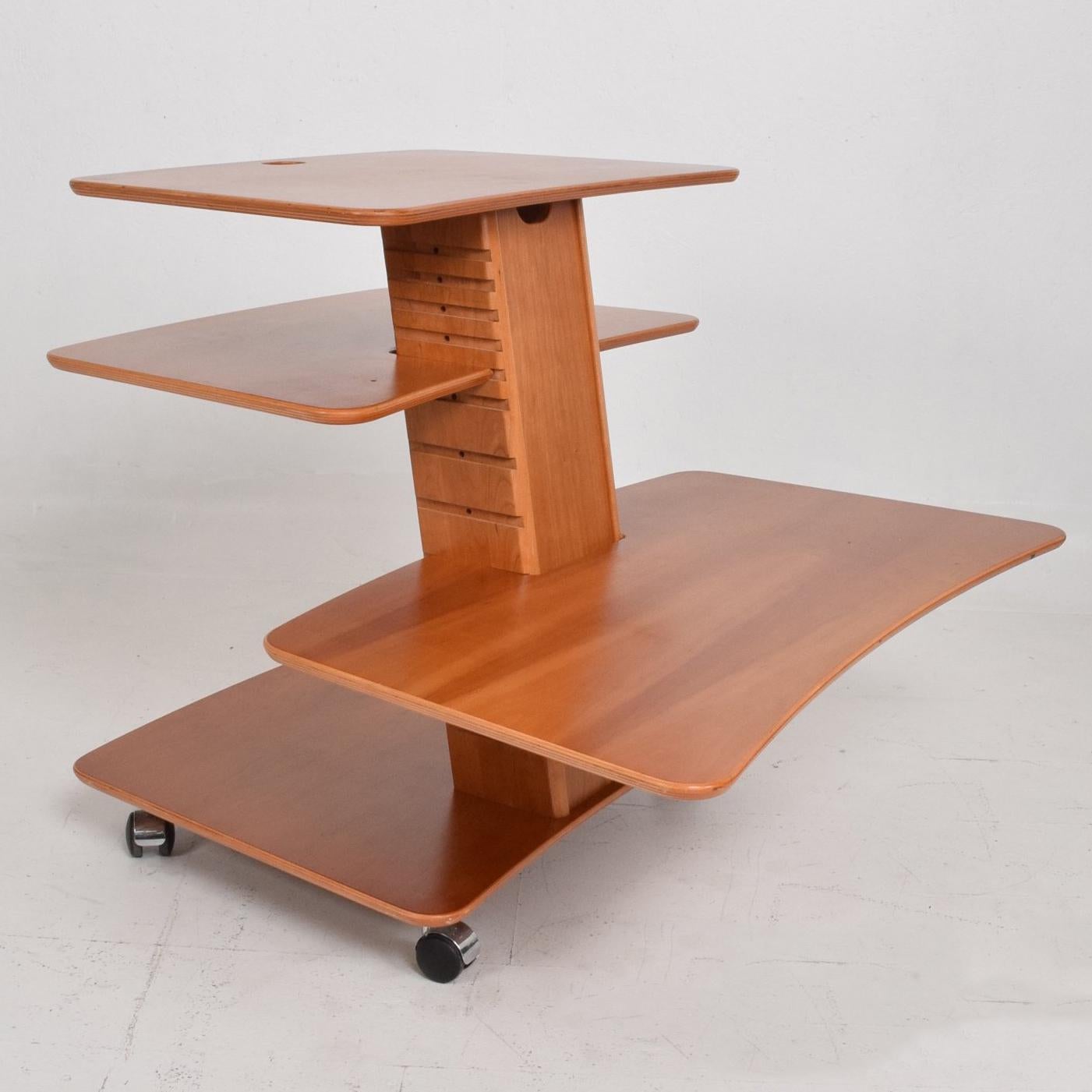 For your consideration a Danish modern adjustable stand/table with wheels. 
Stamped underneath with makers label 
