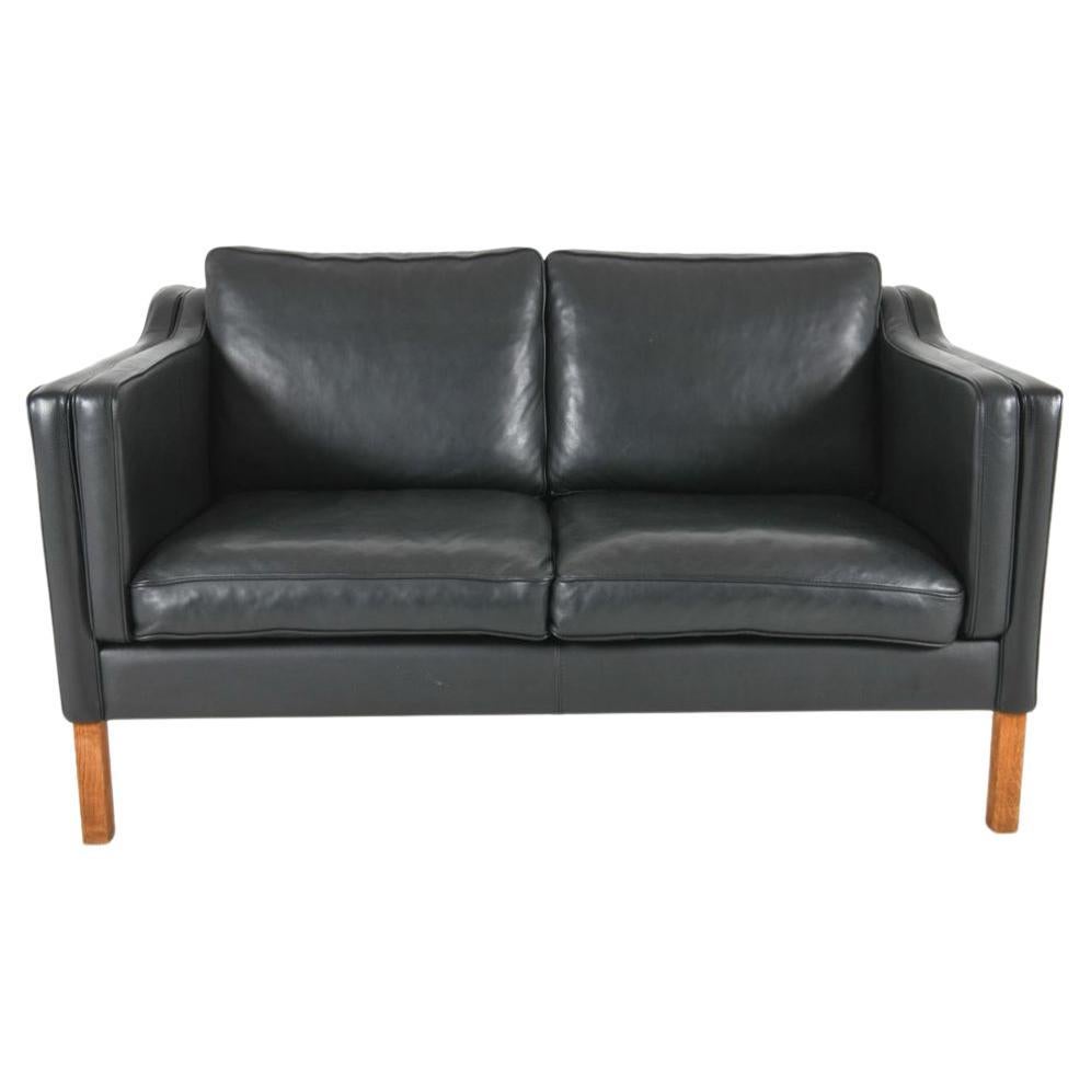 Mid-Century Danish Modern Beautiful Black Leather 2 Seat Sofa oak Legs For Sale