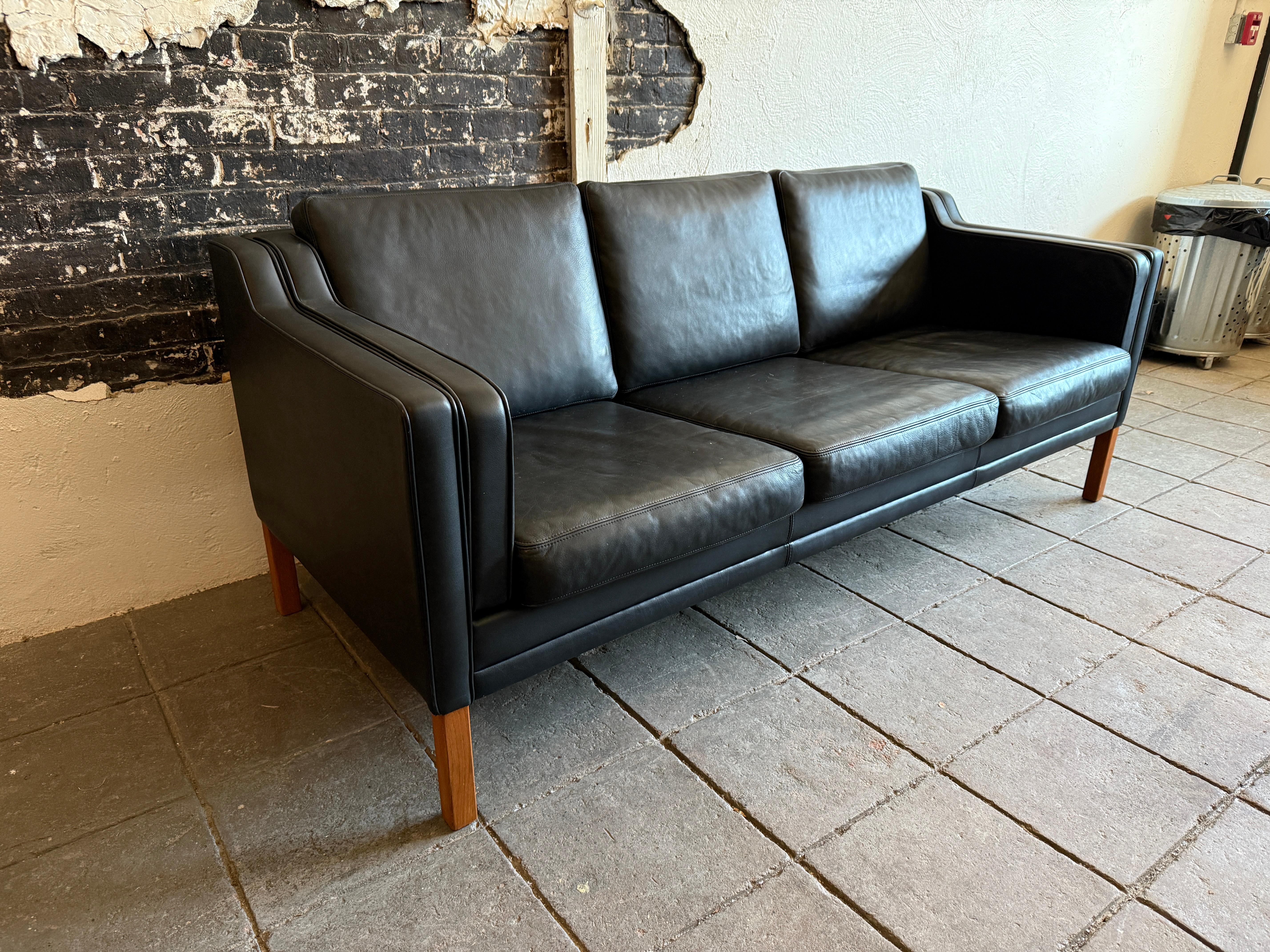 Mid century Danish Modern Beautiful Black Leather 3 Seat Sofa birch Legs In Good Condition In BROOKLYN, NY