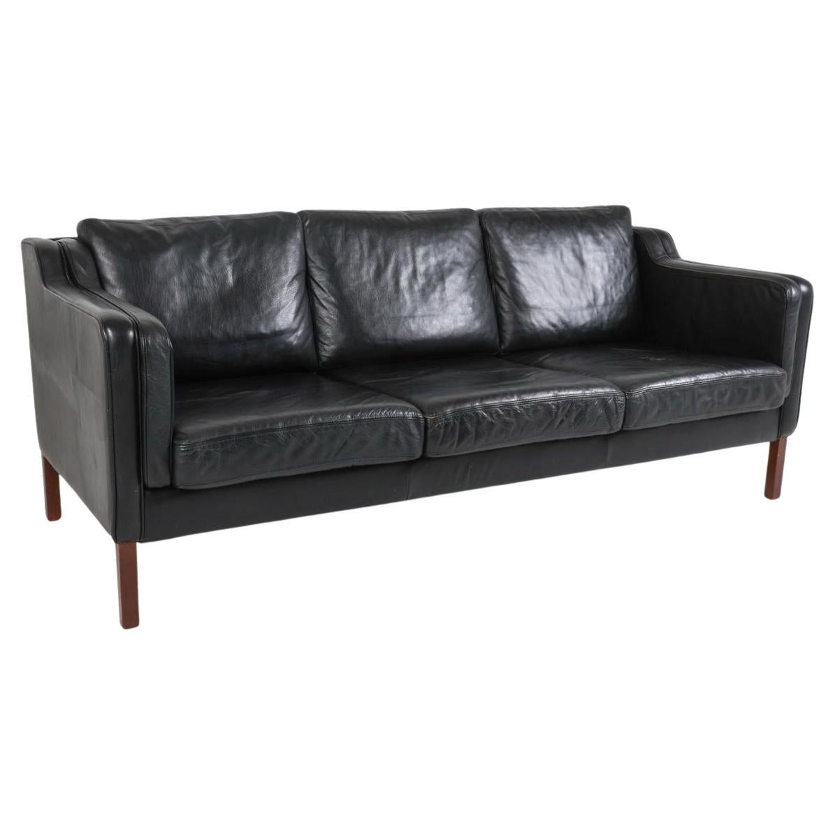 Mid century Danish modern beautiful Black leather 3 seat sofa dark wood legs. Style of Børge Mogensen. Beautiful Black leather is soft and shows little signs of use but broken in nicely. Great Danish Modern sofa. Great condition - very clean. Has