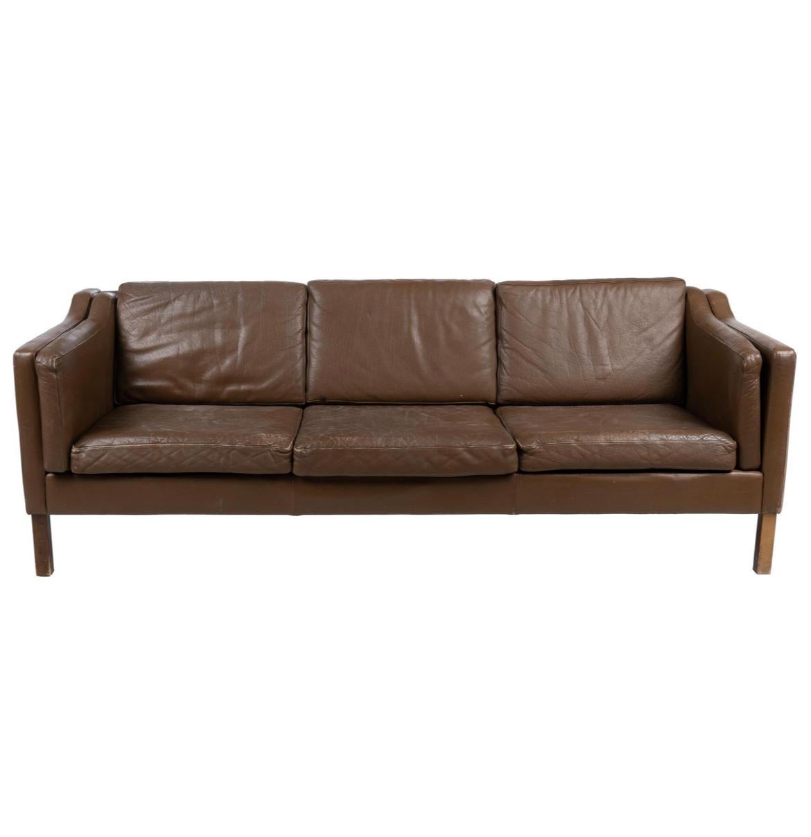 Mid century Danish modern beautiful brown leather 3 seat sofa wood legs. Style of Børge Mogensen.  Brown leather is soft and shows little signs of use but broken in nicely. Great Danish Modern sofa. Great condition. Sofa is made by Stouby in