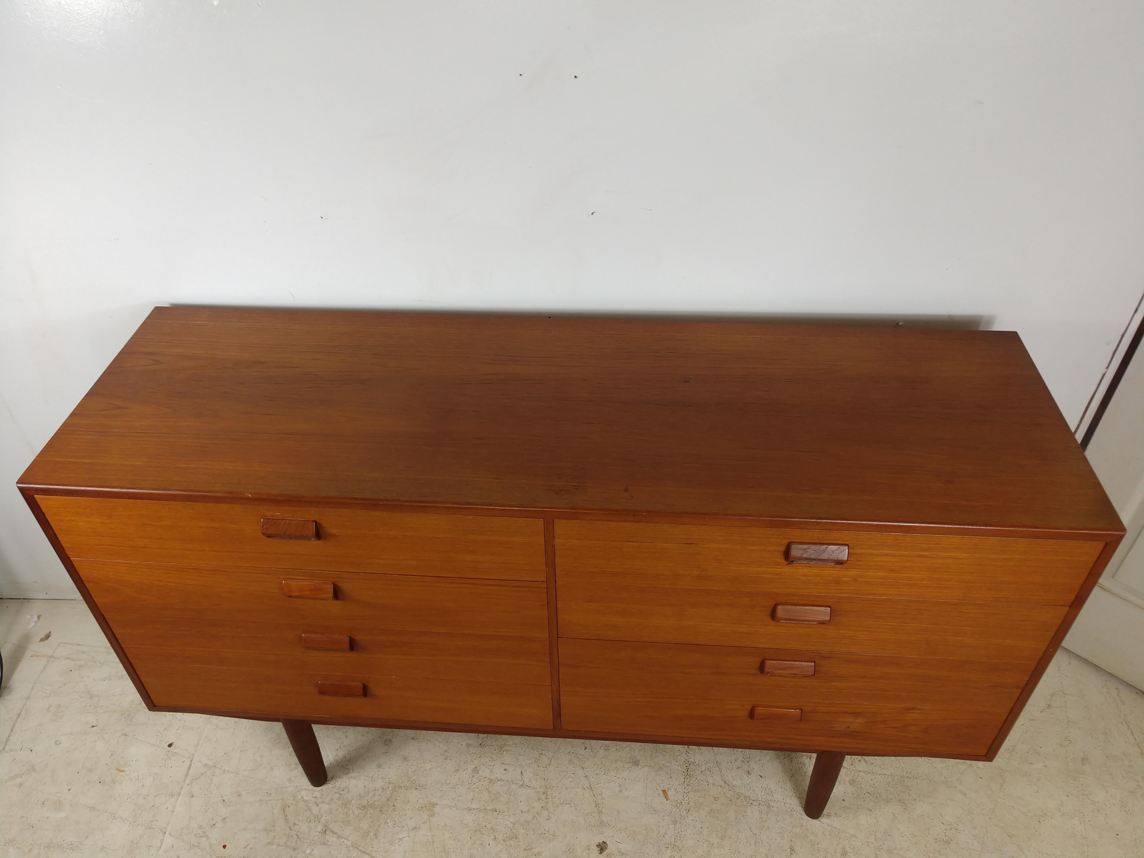Fabulous teak 8 drawer double dresser/credenza by Borge Mogensen. In excellent vintage condition with a small blemish on one drawer front which will be taken care of. Signed on back. Drawers all glide easily.