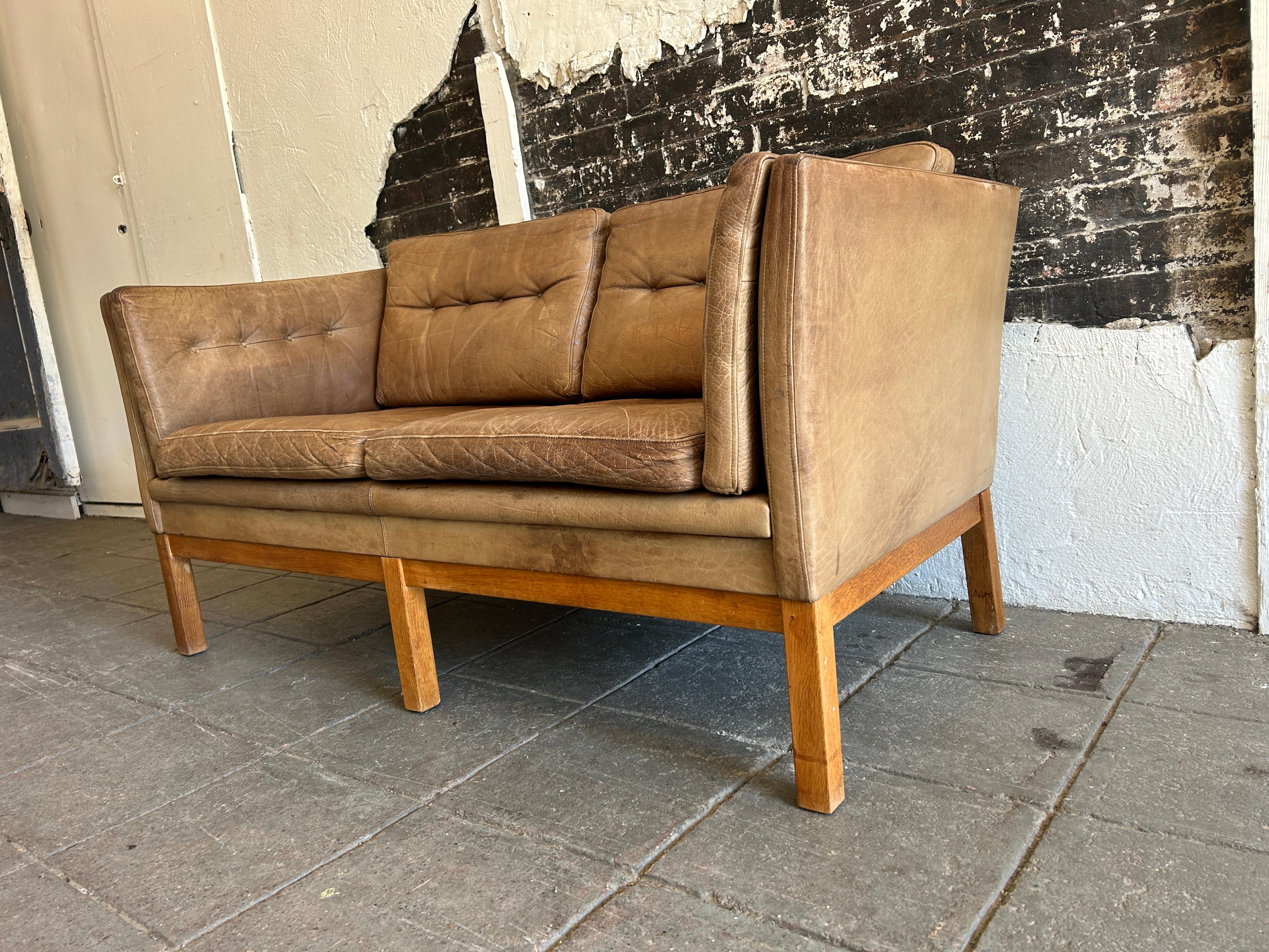 Mid Century Danish Modern Brown Leather 2 Seat Sofa oak legs faded with patina  In Good Condition In BROOKLYN, NY