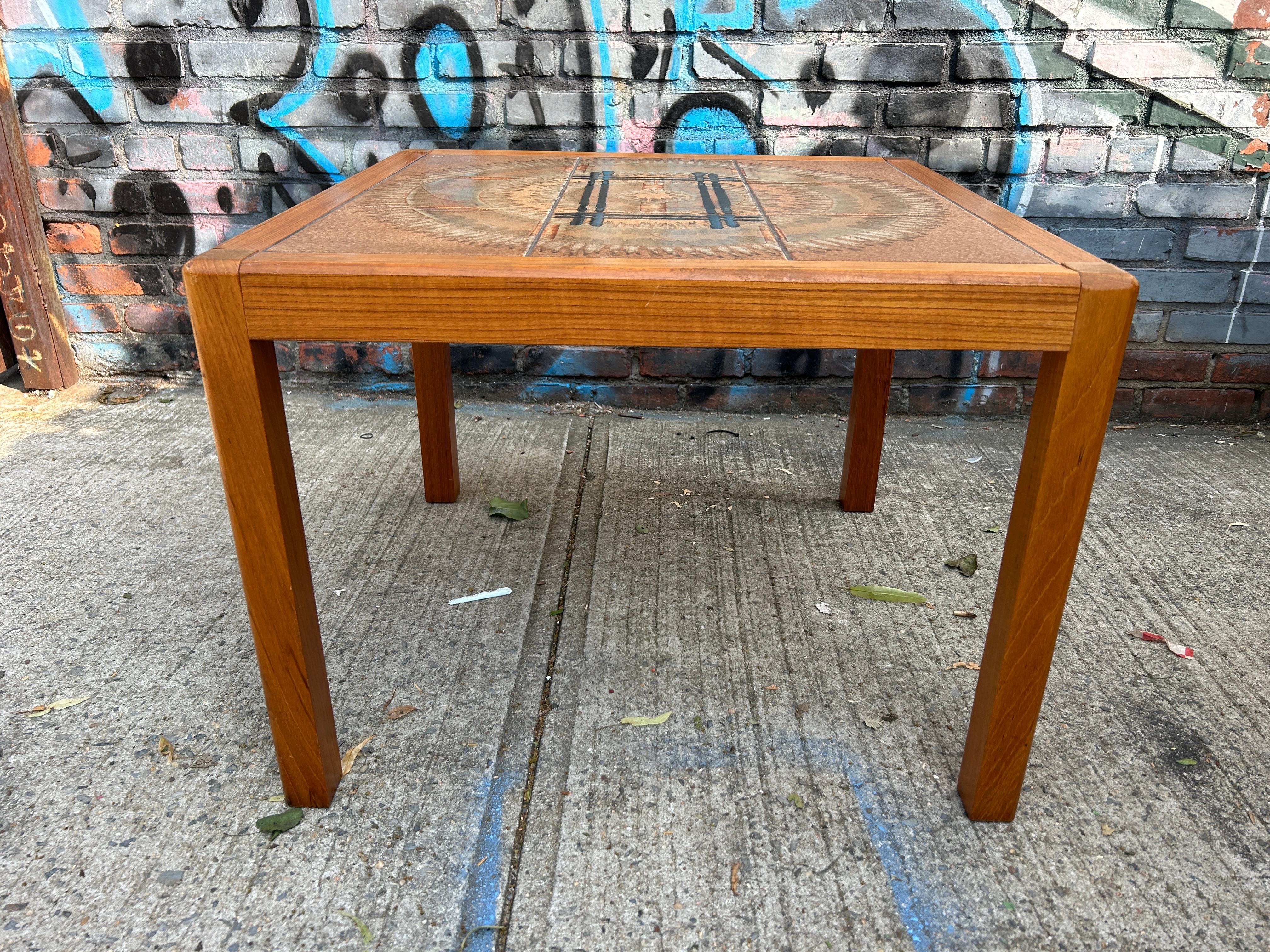 Beautiful Midcentury Danish modern teak and ceramic tile coffee or side table by Nordisk Andels-Eksport. Great simple design and great vintage condition - clean inside and out. Beautiful Scandinavian inlaid tiles on top surface. Made in Denmark -