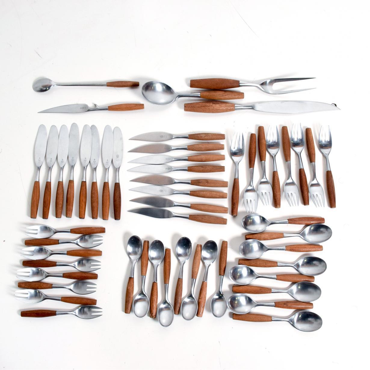 For your consideration, a Dansk Flatware Set 53 Pieces. Constructed with Teak Stainless. Model Fjord, designed by  Jens H Quistgaard. 


Some items are marked Denmark, other are made in Germany.  Very rare and hard to find this set with some many