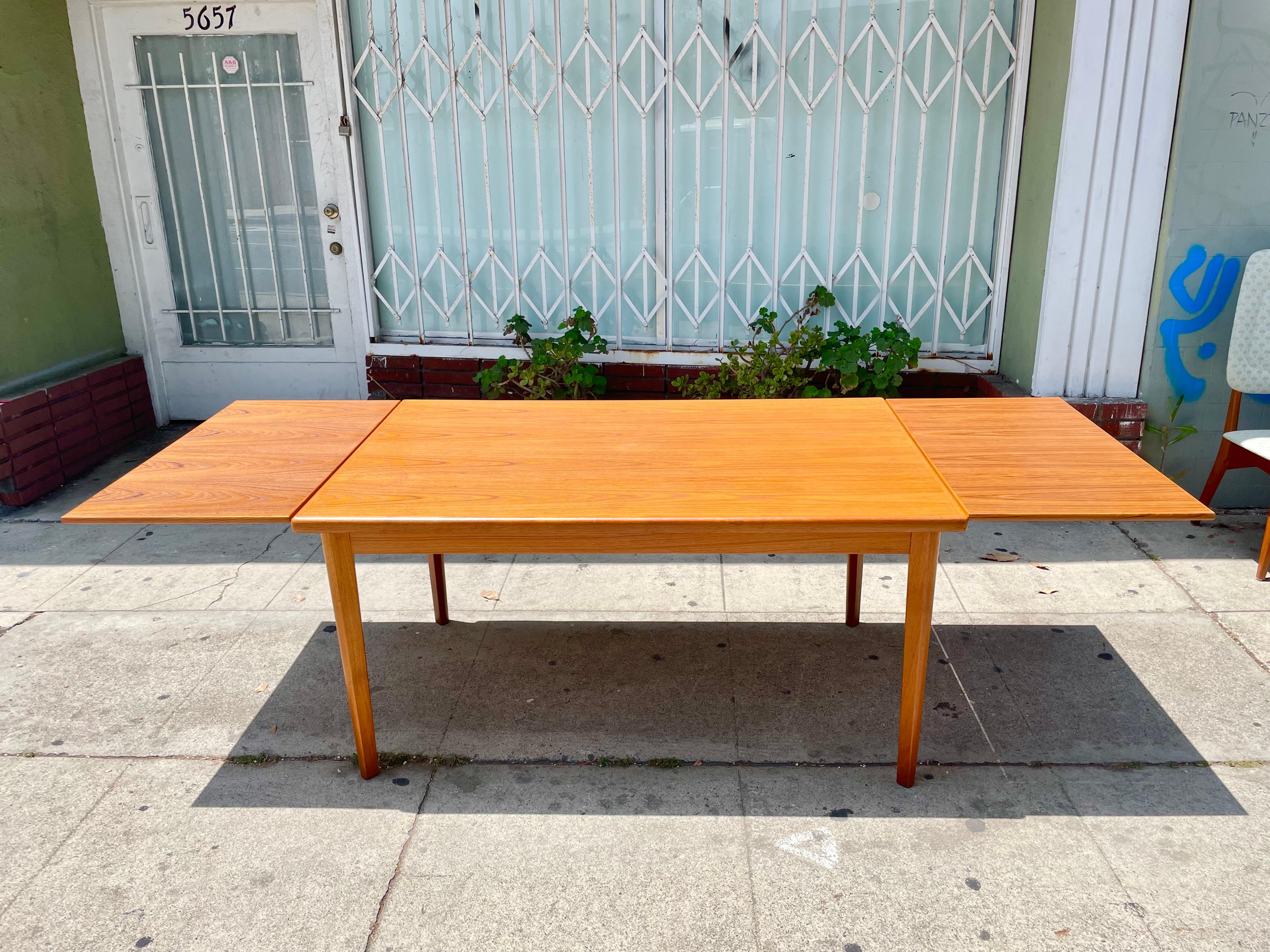 Mid-20th Century Midcentury Danish Modern Extendable Teak Dining Table and Chairs For Sale