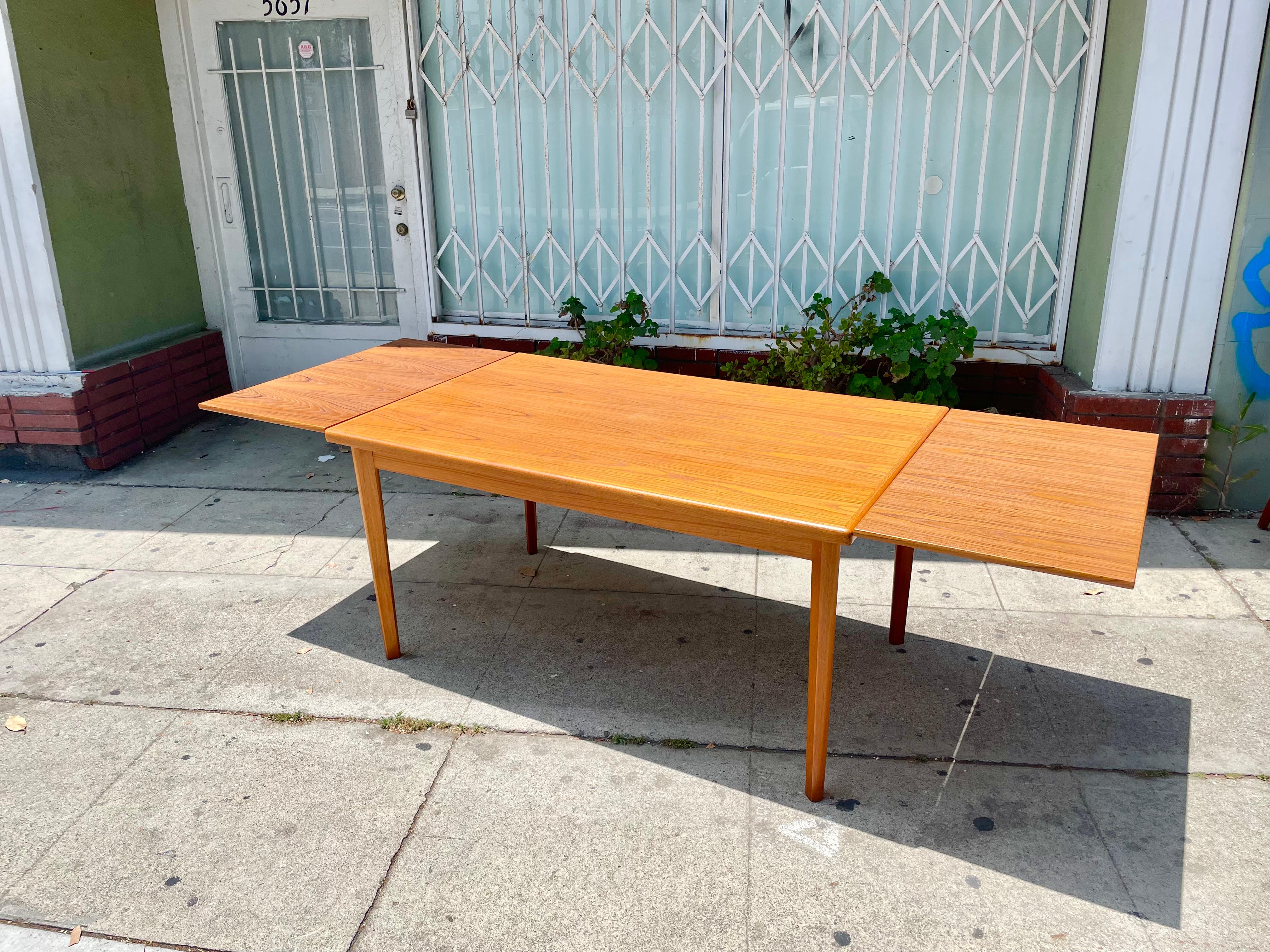 Fabric Midcentury Danish Modern Extendable Teak Dining Table and Chairs For Sale