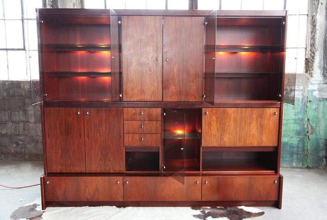 Teak, Danish, Cadovius, Poul Cadovius, Royal System, rosewood, stereo, records, bookshelves, bookshelf, glass, veneer.

This substantial mid century wall unit has it all! It makes the perfect statement piece, to create the perfect setting for any