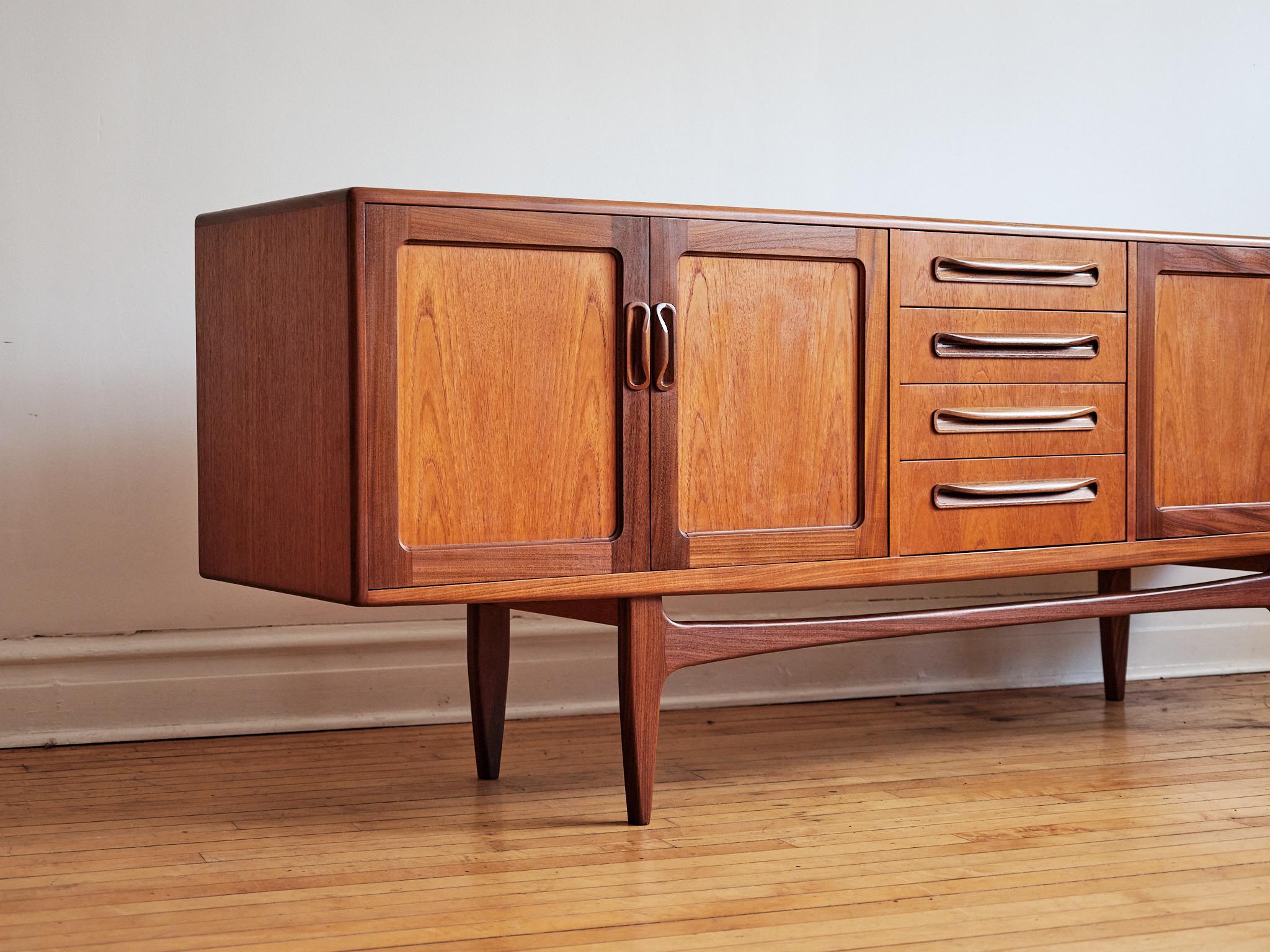 Mid-Century Modern multi-toned teak sideboard.
Just imported from England.
Designed by Victor Wilkins for G Plan's 