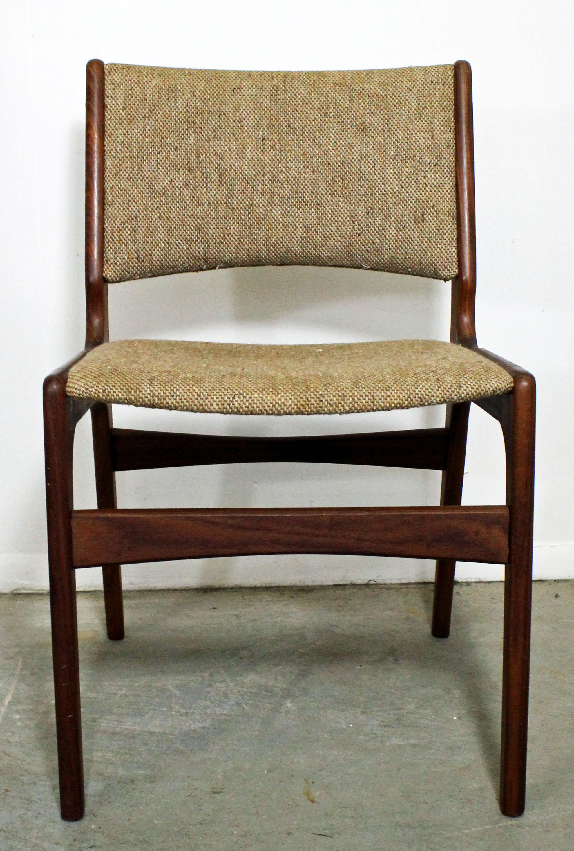 What a find. Offered is a single, teak side chair with an upholstered seat. It is in good condition, showing normal age wear see photos). It is not signed. Check out our other listings for a matching set of 6 chairs, as well as more Mid-Century