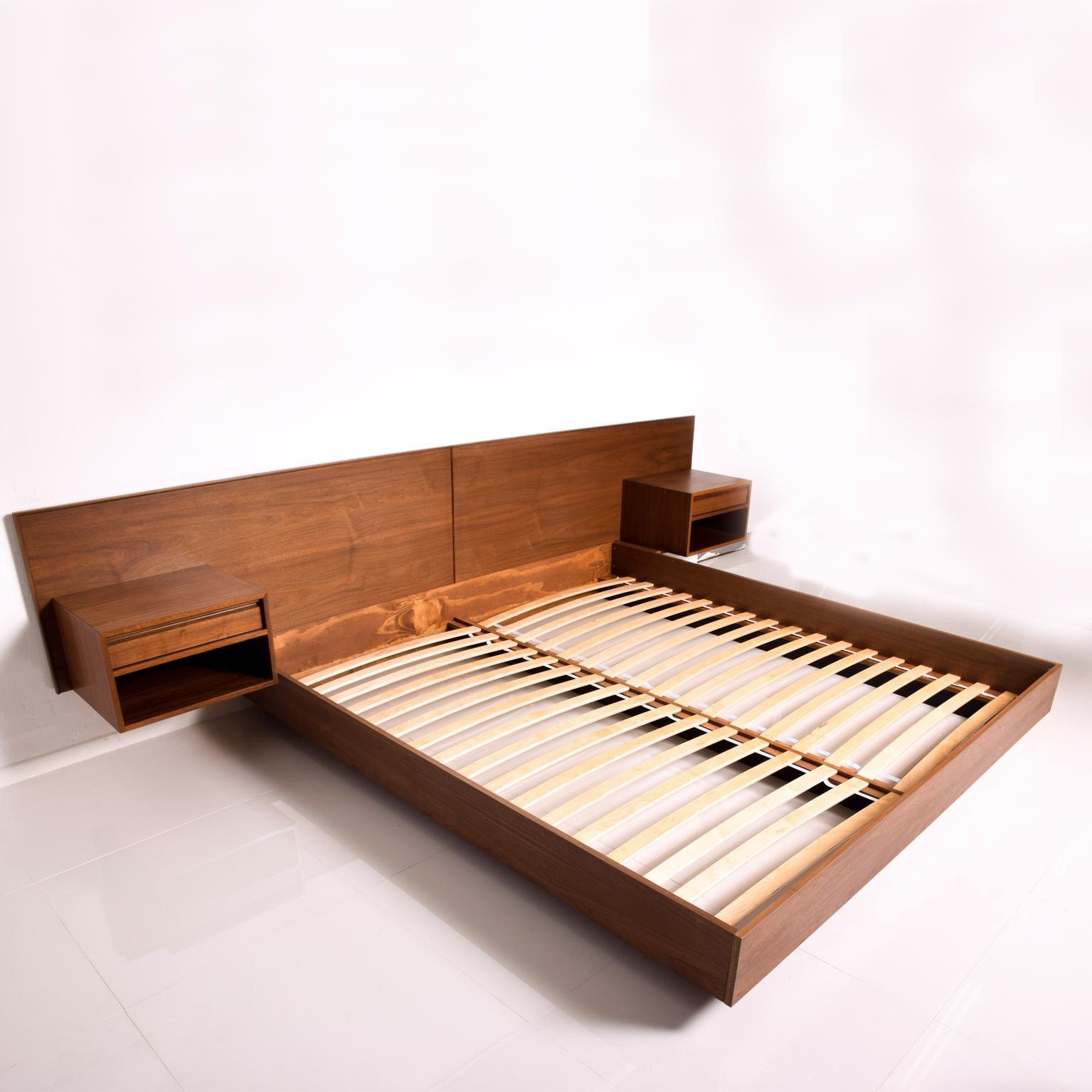 For your consideration a Mid Century Modern Platform Bed King Size in Walnut Wood with Floating Nightstands.Designed by Pablo Romo for Ambianic.
Reference # BEDGM1217192
Amazing Clean Modern Lines- Simple and Elegant.
Dimensions are: 125