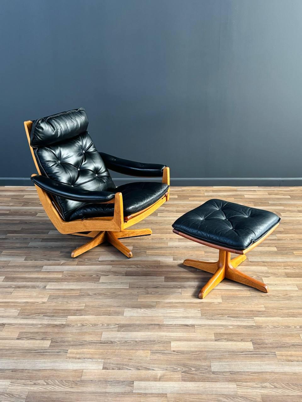 Materials: Teak, Black Leather

Dimensions: 
Chair:
35”H x 32”W x 32”D
Seat Height 17”
Ottoman:
16”H x 19”W x 19”D