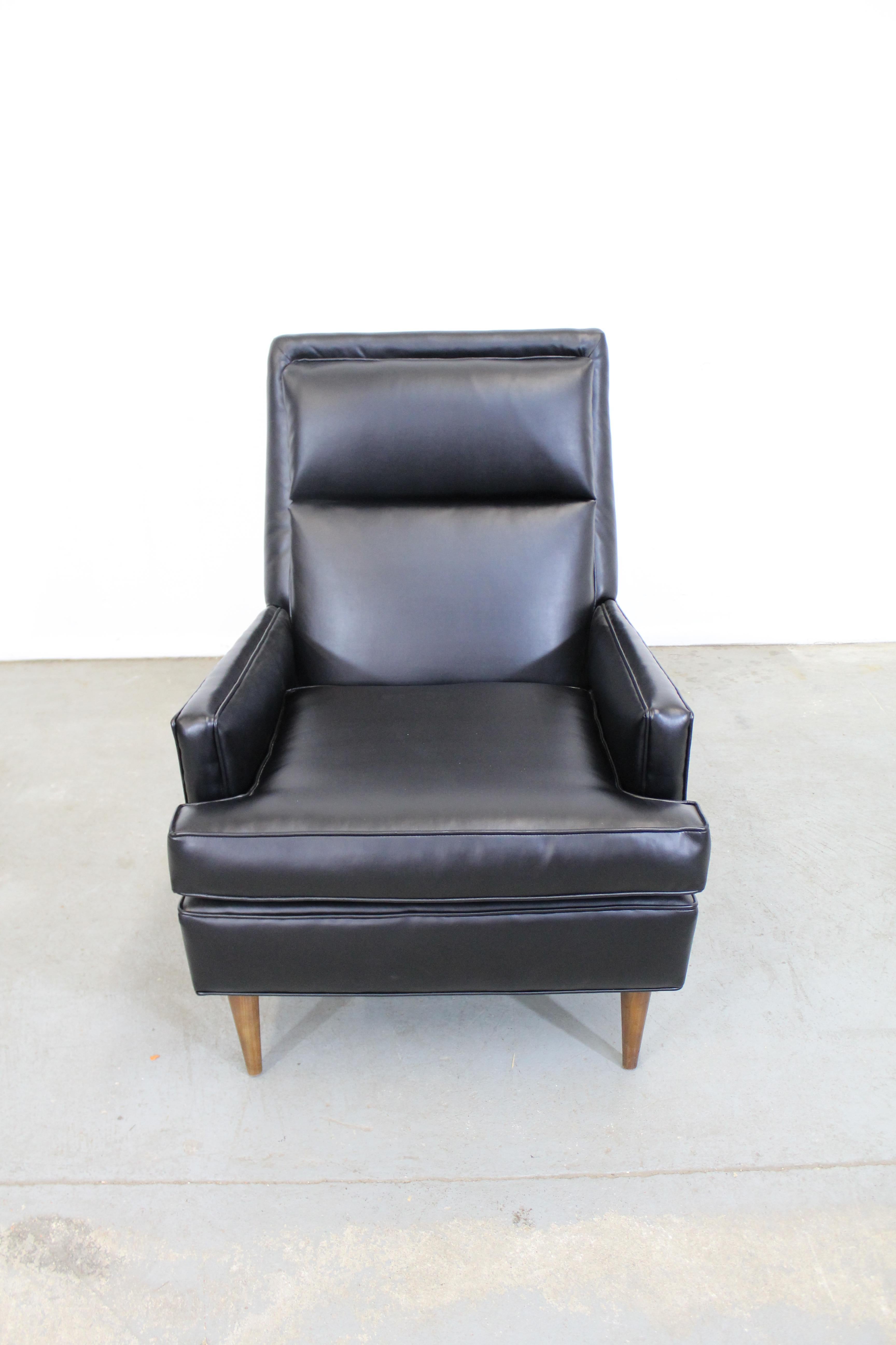 What a find. Offered is a Mid-Century Modern lounge chair attributed to Selig. This piece has been restored with reupholstered bonded leather. In excellent condition, only showing age wear on the legs. Its tag has been removed by previous owner. See