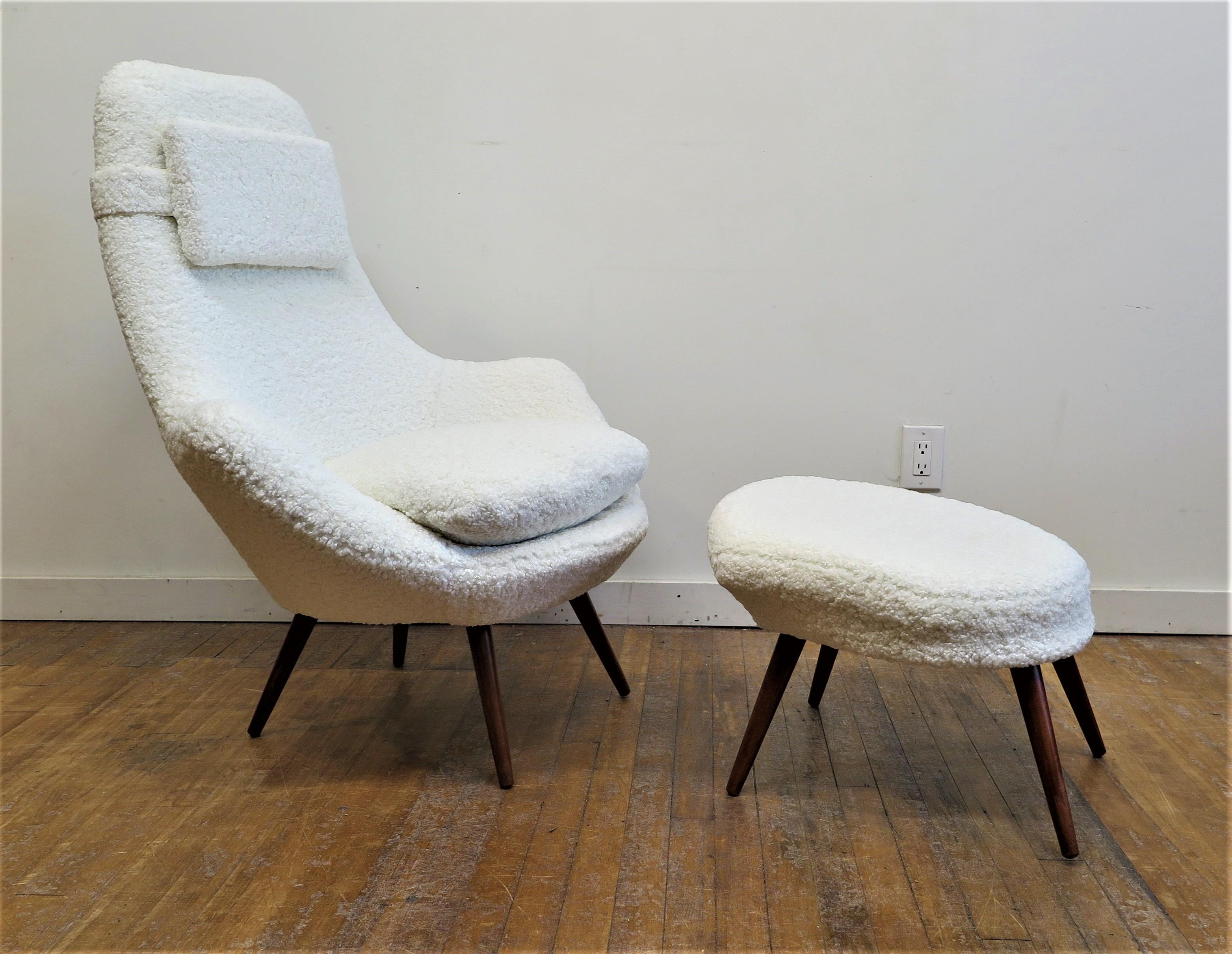 Mid Century Danish Modern Lounge Chair with ottoman. Danish modern cloud lounge chair from 1960's. Sculpted open arm chair on splayed teak legs with sculpted matching ottoman covered in faux fur shearling. In very good condition both the chair and
