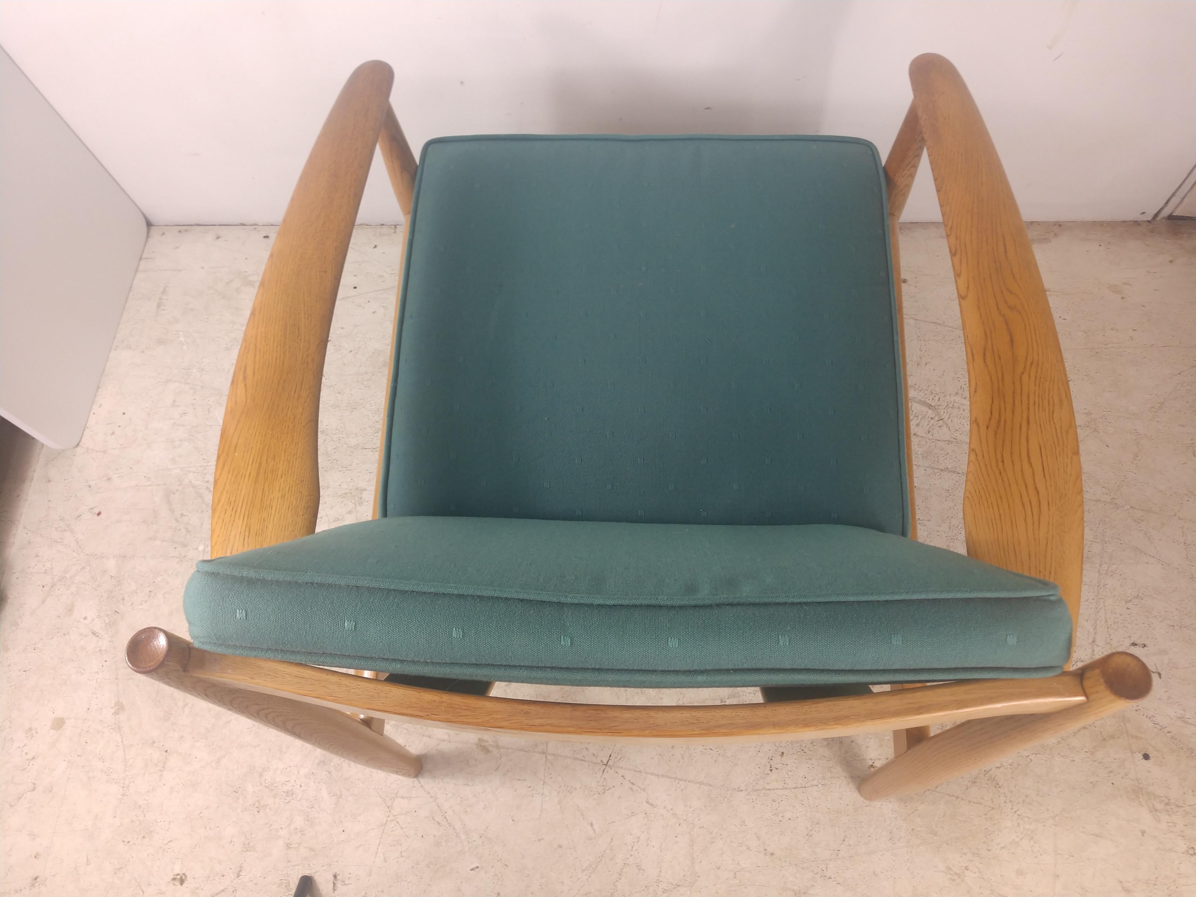 Beautiful sculpted oak frames with ample room make these a super comfortable lounge chair . Model # 118 by France & Sons c1960. Cushions are serviceable, no problems but could use an upgrade.
Seat hgt. is 16.