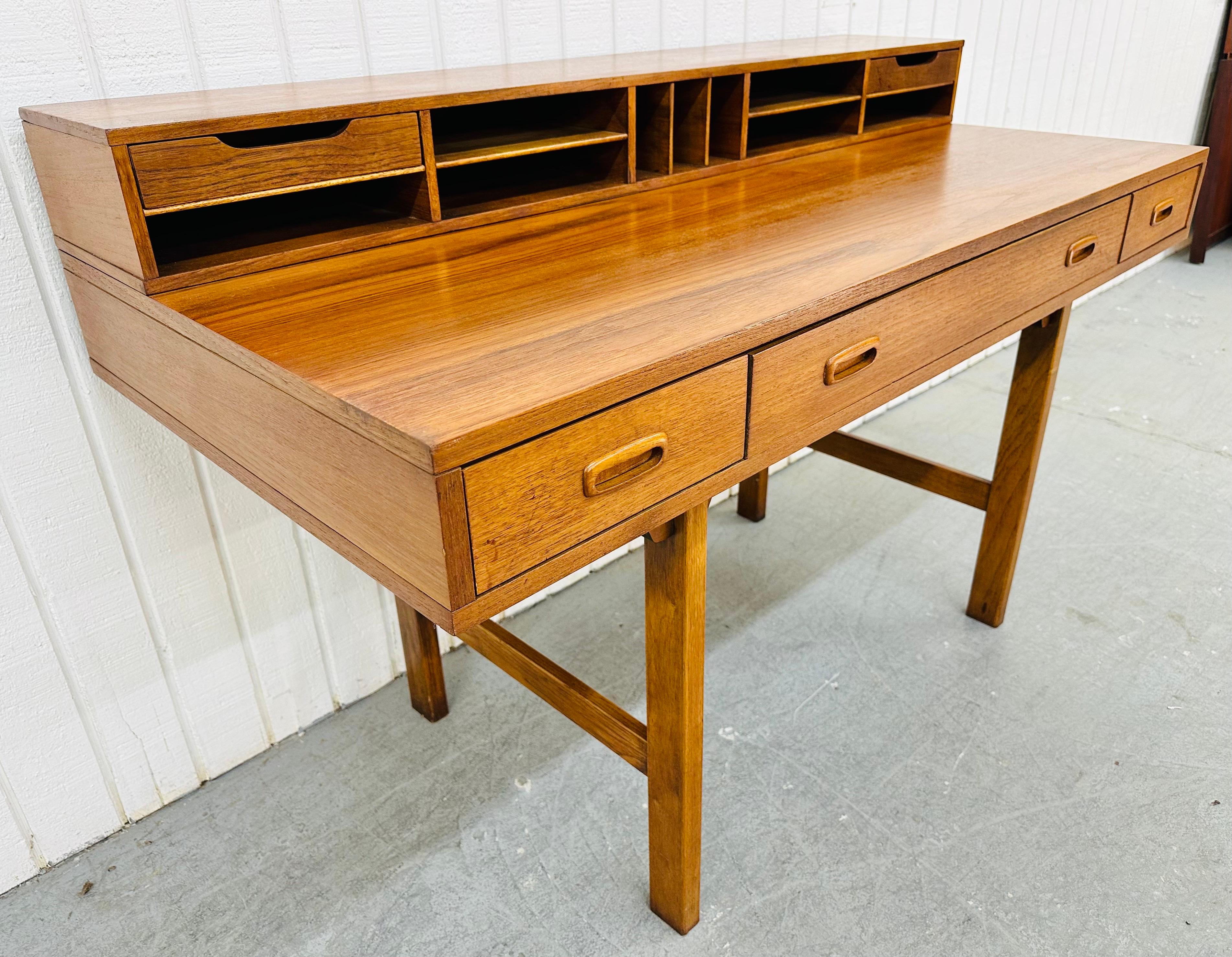 This listing is for a Mid-Century Danish Modern Lovig Style Teak Flip-Top Partners Desk. Featuring a straight line Peter Lovig style design, flip-top that expands the desk top to 36” W, multiple drawers and storage space, recessed wooden pulls,