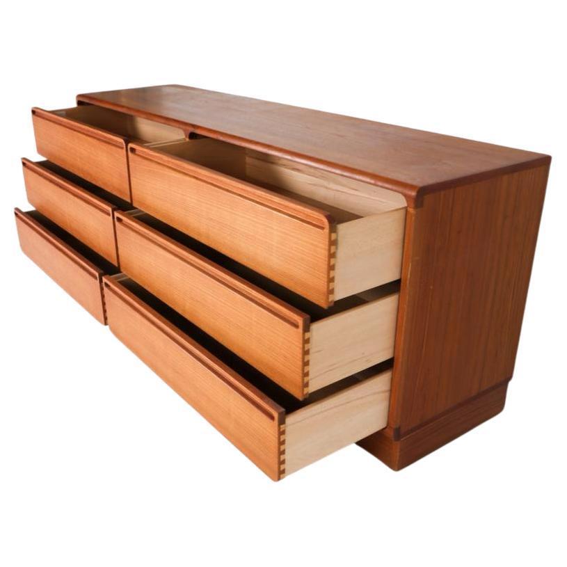 Scandinavian Modern Mid century danish modern low long teak dresser by Nils Johnson Torring mobler For Sale