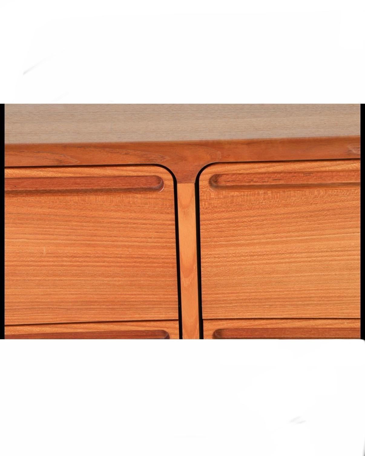 Woodwork Mid century danish modern low long teak dresser by Nils Johnson Torring mobler For Sale