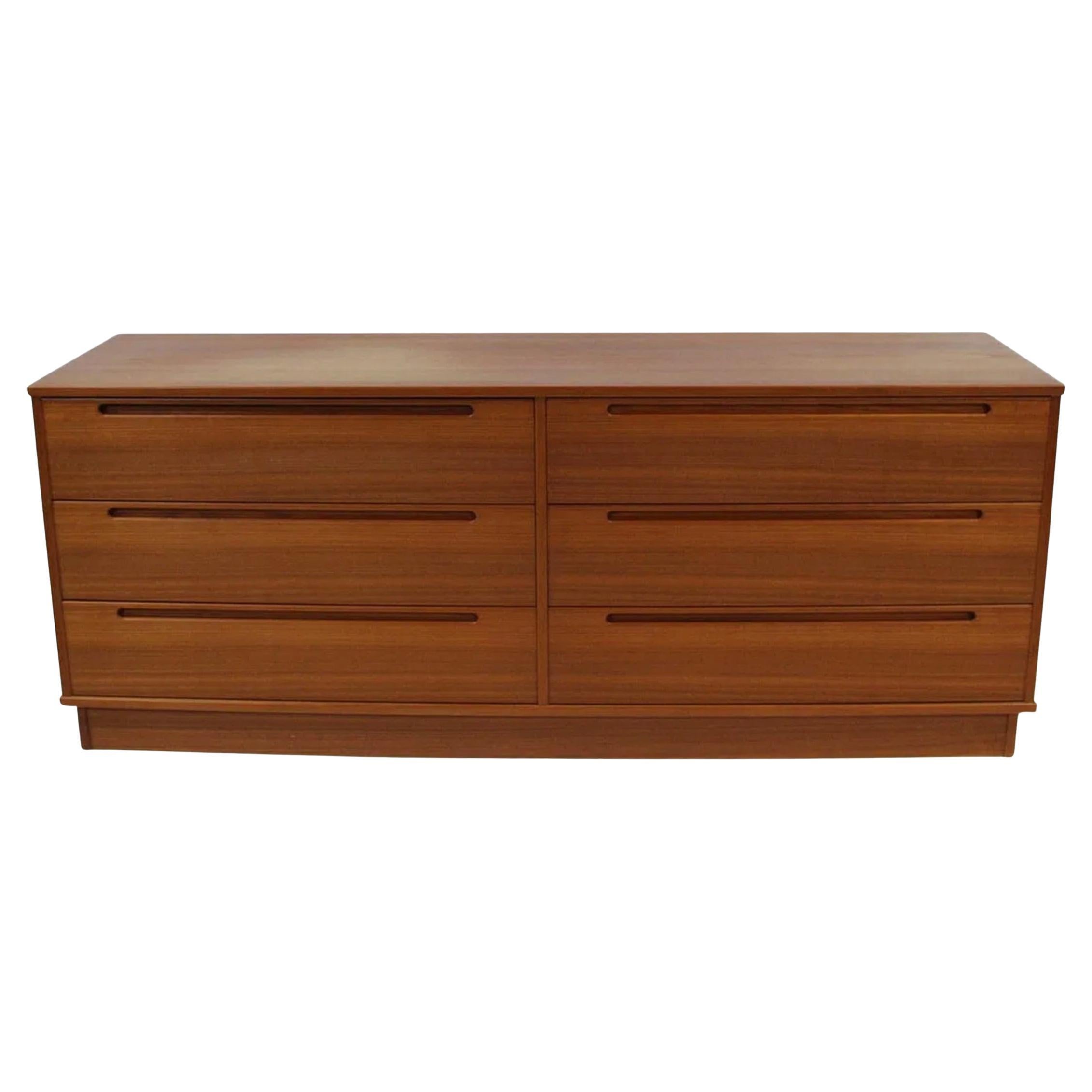Mid century danish modern low teak dresser by Nils Jonsson Torring mobler For Sale