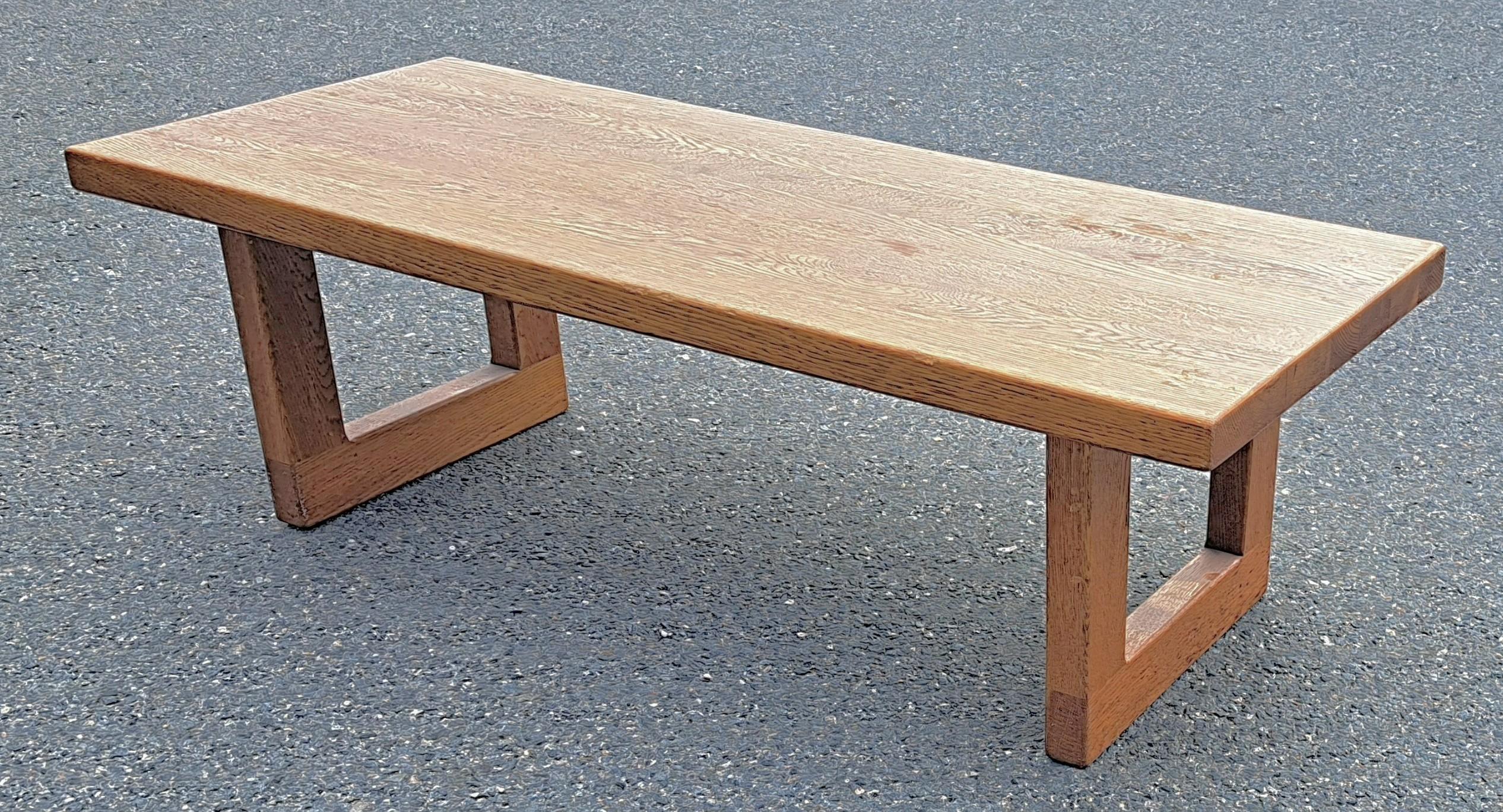 Mid-Century / Danish Modern style minimalist bench coffee table with stable closed loop base and heavy wood top. Very sturdy coffee table / bench.