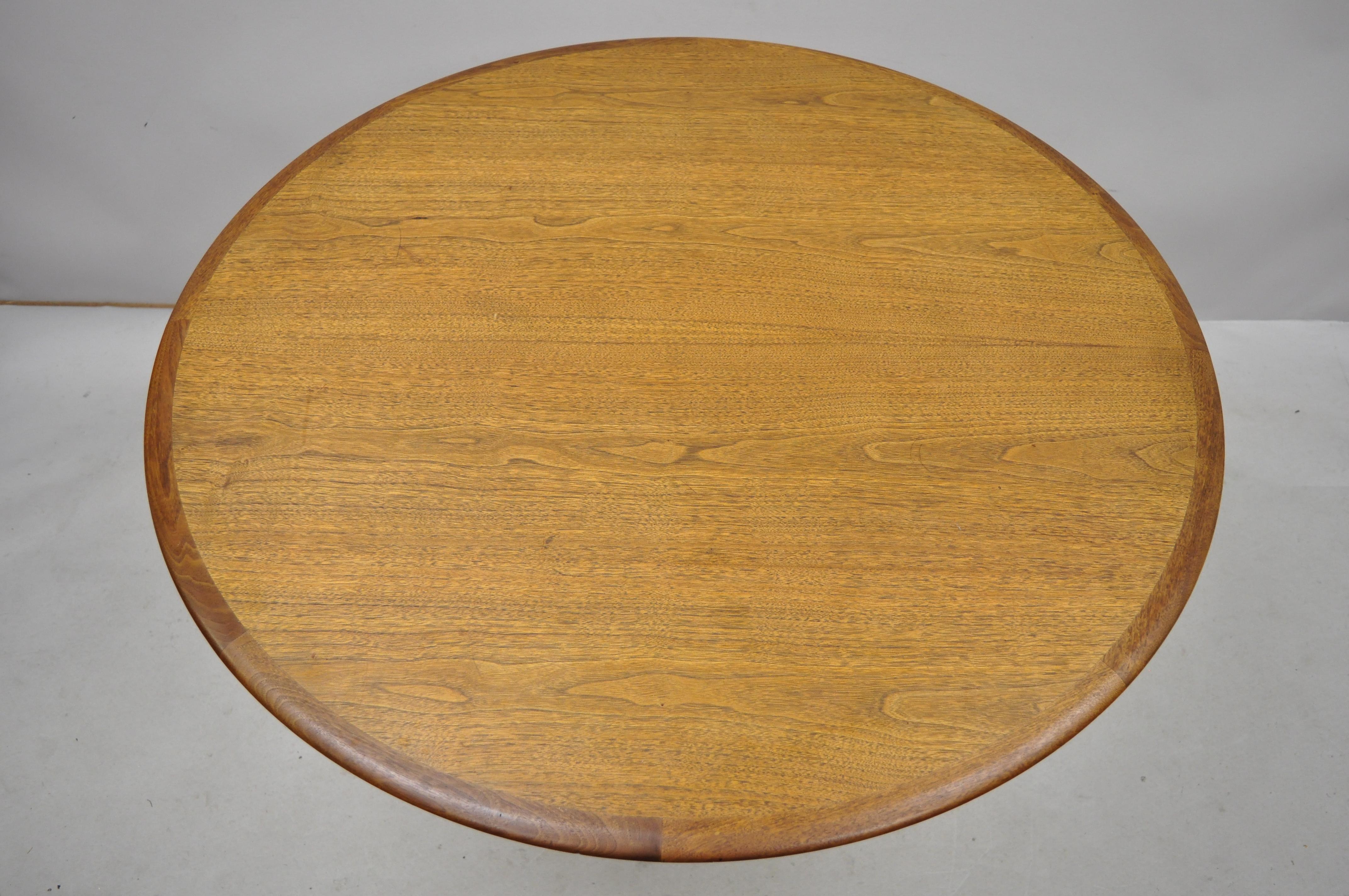 Midcentury Danish modern Moreddi Andersen walnut round dining table burke propeller base. Item includes a round walnut top, metal propeller base, beautiful wood grain. Base and top have been married together. Base is believed to be by Burke and the