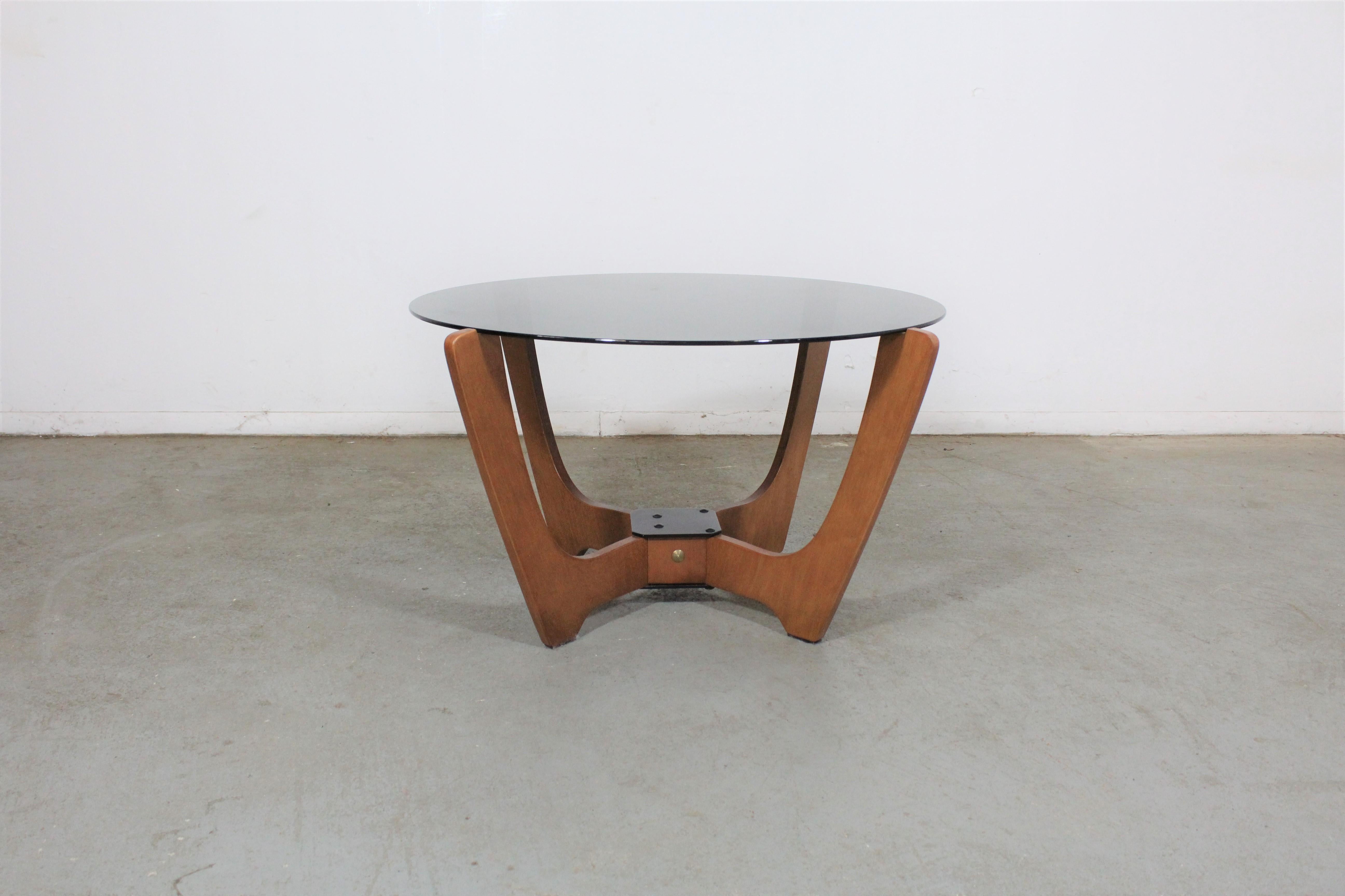 Odd Knutsen midcentury Danish modern glass top coffee table.

Offered is a vintage glass top coffee table. This table is signed by Luna and made by Norwegian designer Odd Knutsen. It is in good structurally sound condition with some cosmetic wear