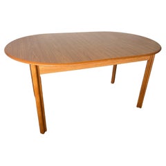 Mid Century Danish Modern Oval Teak Table With Pop Up Butterfly Extension Leaf