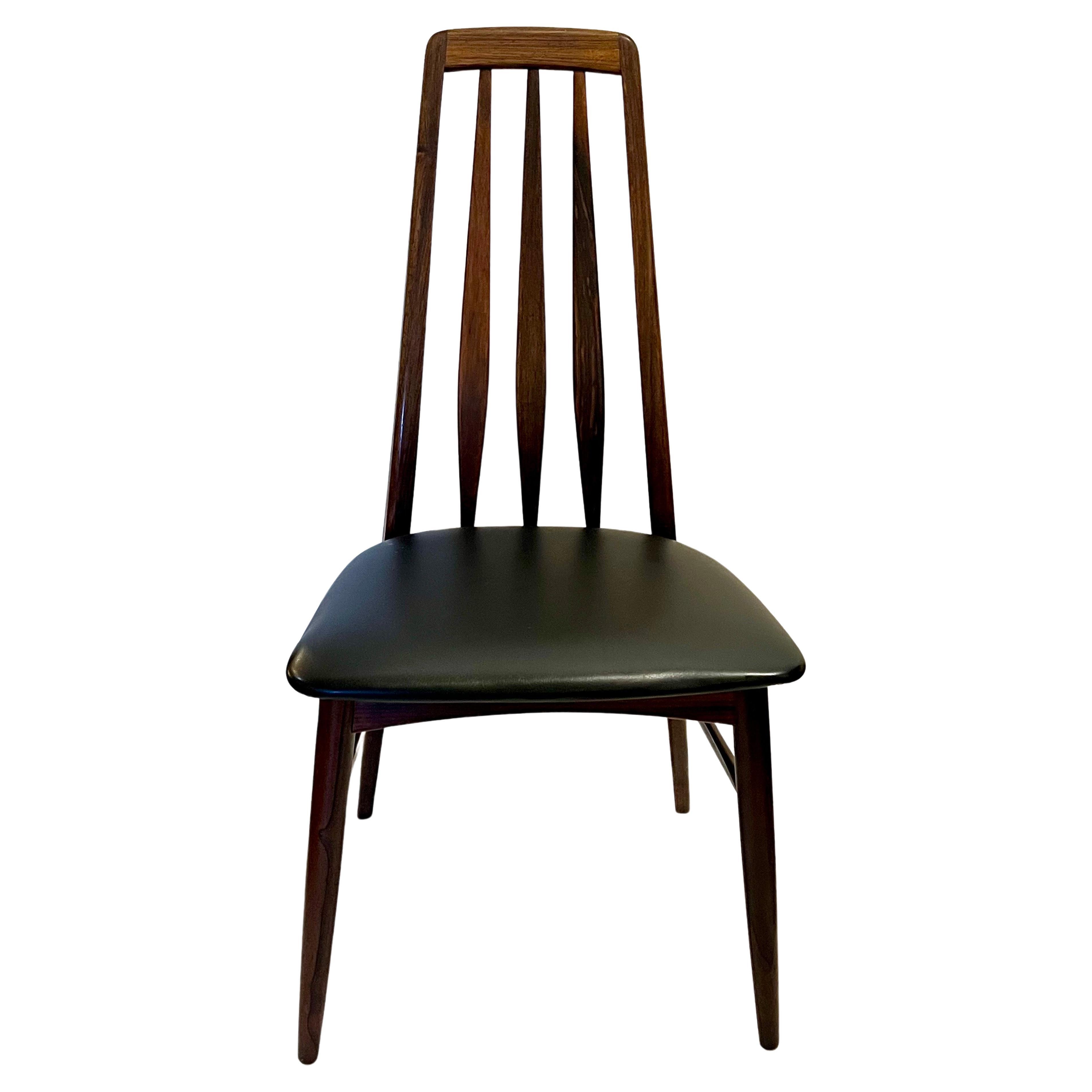 Mid-Century Modern Scandinavian pair of 2 dining desk chairs in rosewood model Eva by Niels Koefoed. a very rare set to find in rosewood 2 more available with arms if buyer is interested all original finish and seats, solid and sturdy we have