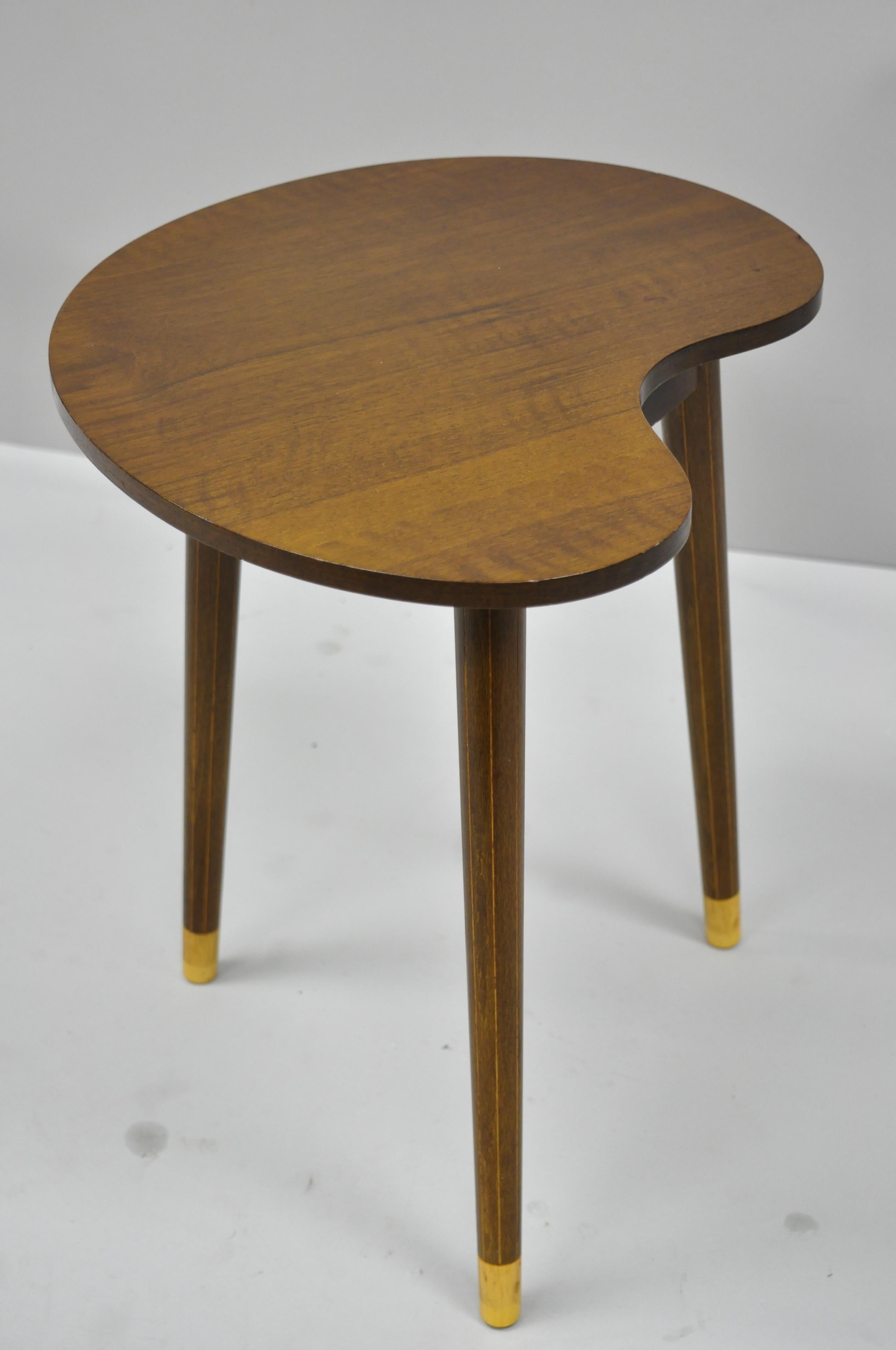 Midcentury Danish modern palette tripod side table attributed to Christensen & Larsen. Item features 