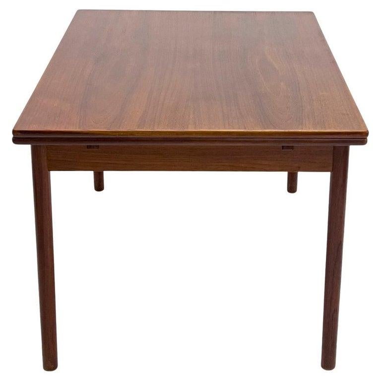 Mid-Century Modern Table de salle à manger rectangulaire en teck de style danois moderne du milieu du siècle dernier par George Tanier en vente