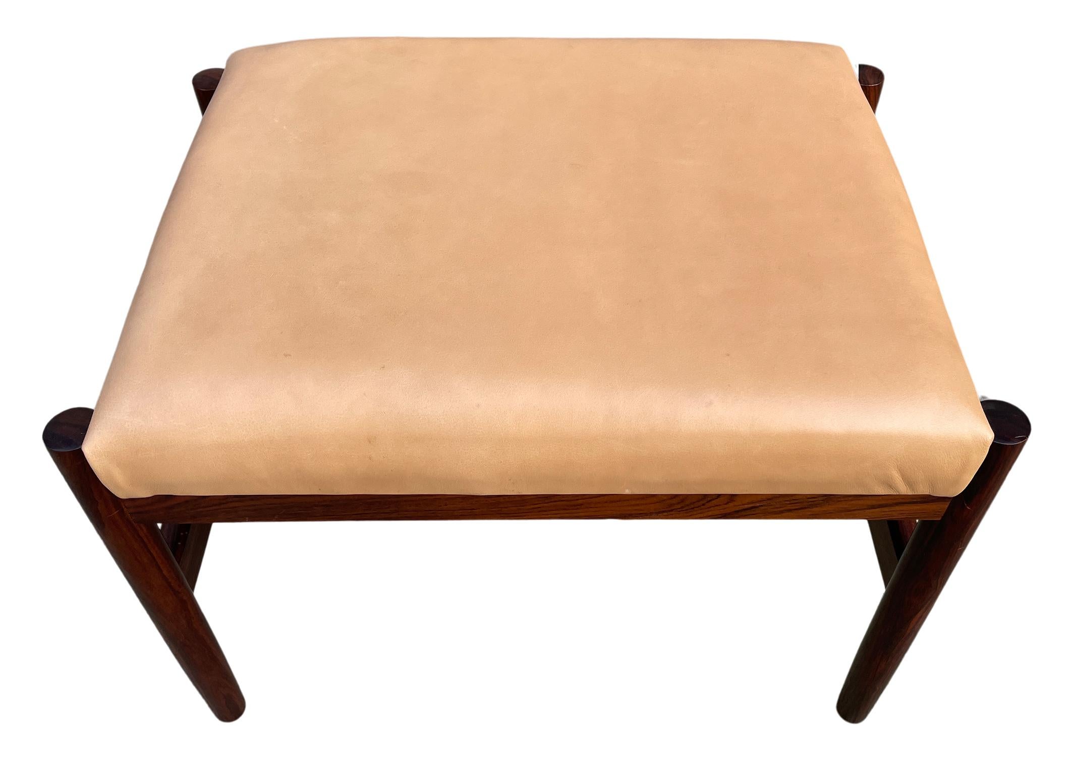 Mid Century Danish Modern spottrup mobler rosewood and leather small stool bench or ottoman. Solid rosewood - Tan leather seat cushion. Great vintage condition.
