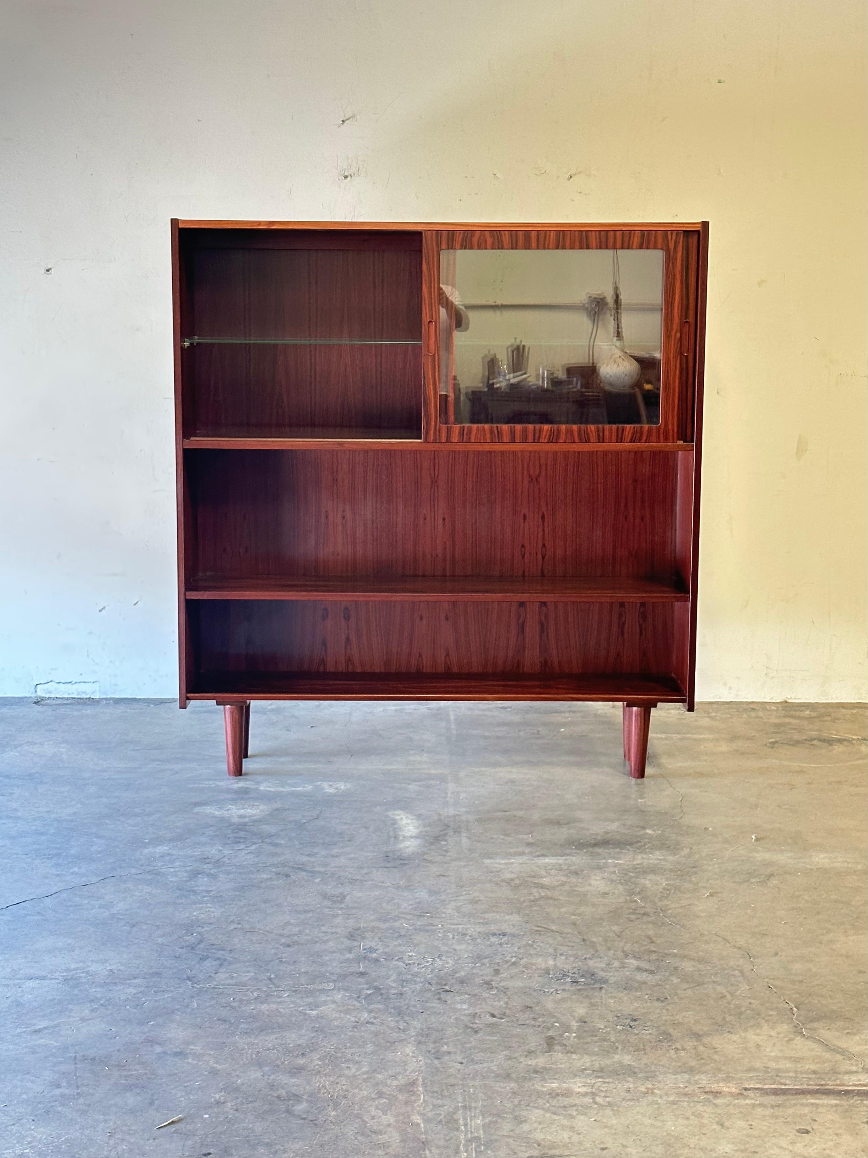 Midcentury Danish Modern Rosewood Bookcase Display Cabinet 

Need a place to store books, glassware or something else cool that you like to collect? This mid century modern cabinet with glass doors is a great solution! 

This vintage 1960’s china