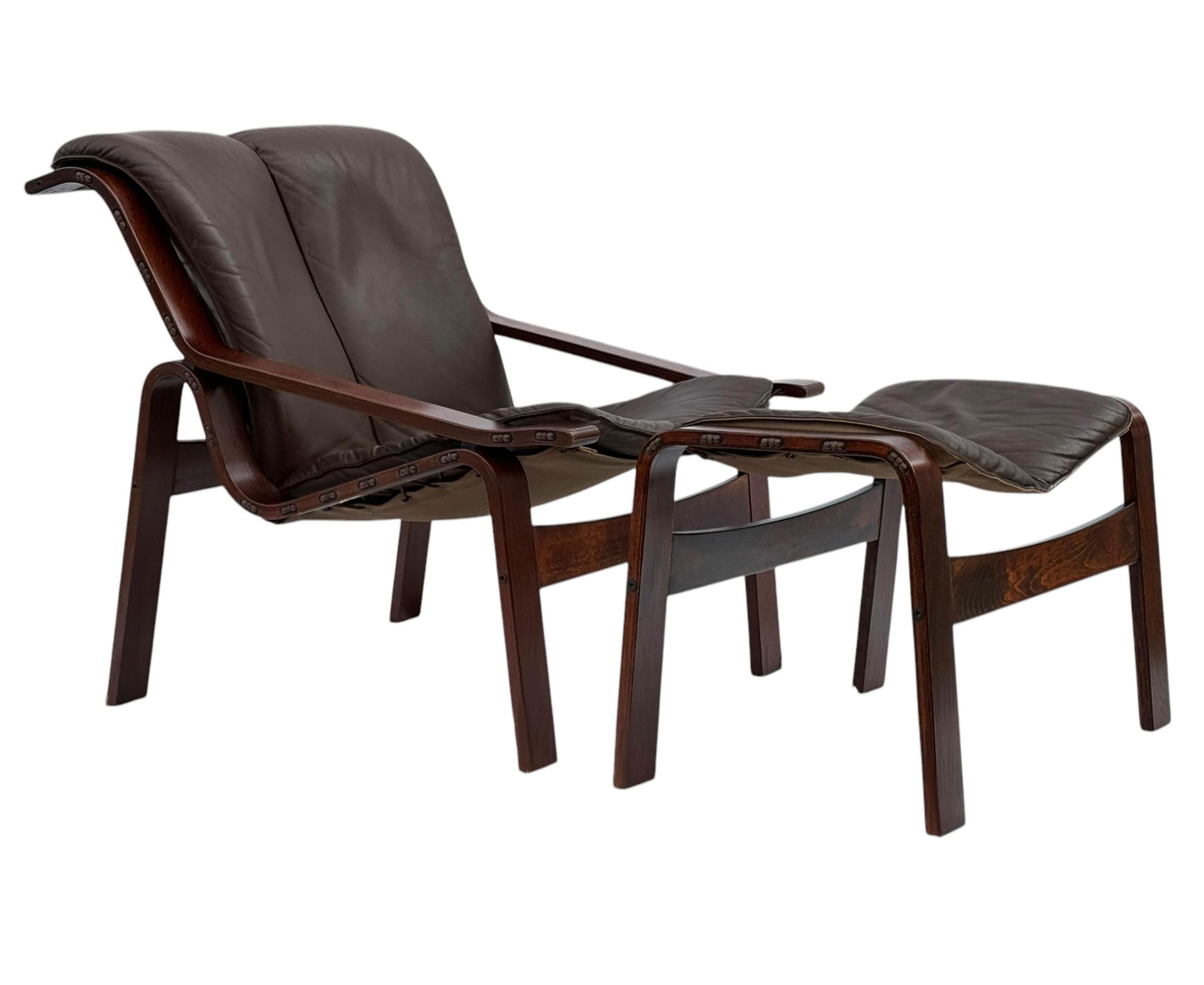 Mid-Century Danish Modern Rosewood & Brown Leather Lounge Chair & Ottoman Set In Good Condition For Sale In Philadelphia, PA