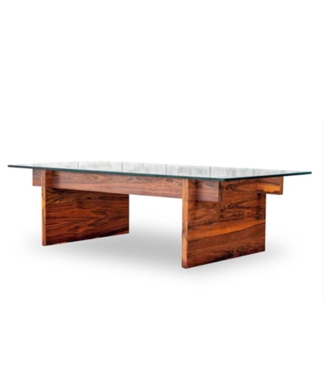Danish Modern  Rosewood coffee table / cocktail table with glass top. Designed and made by Svend Langkilde. Made in Denmark in the 1960s 

This is a Gorgous and Sophisticated large glass top coffee table

 Glass is 3/4 of an inch thick and very