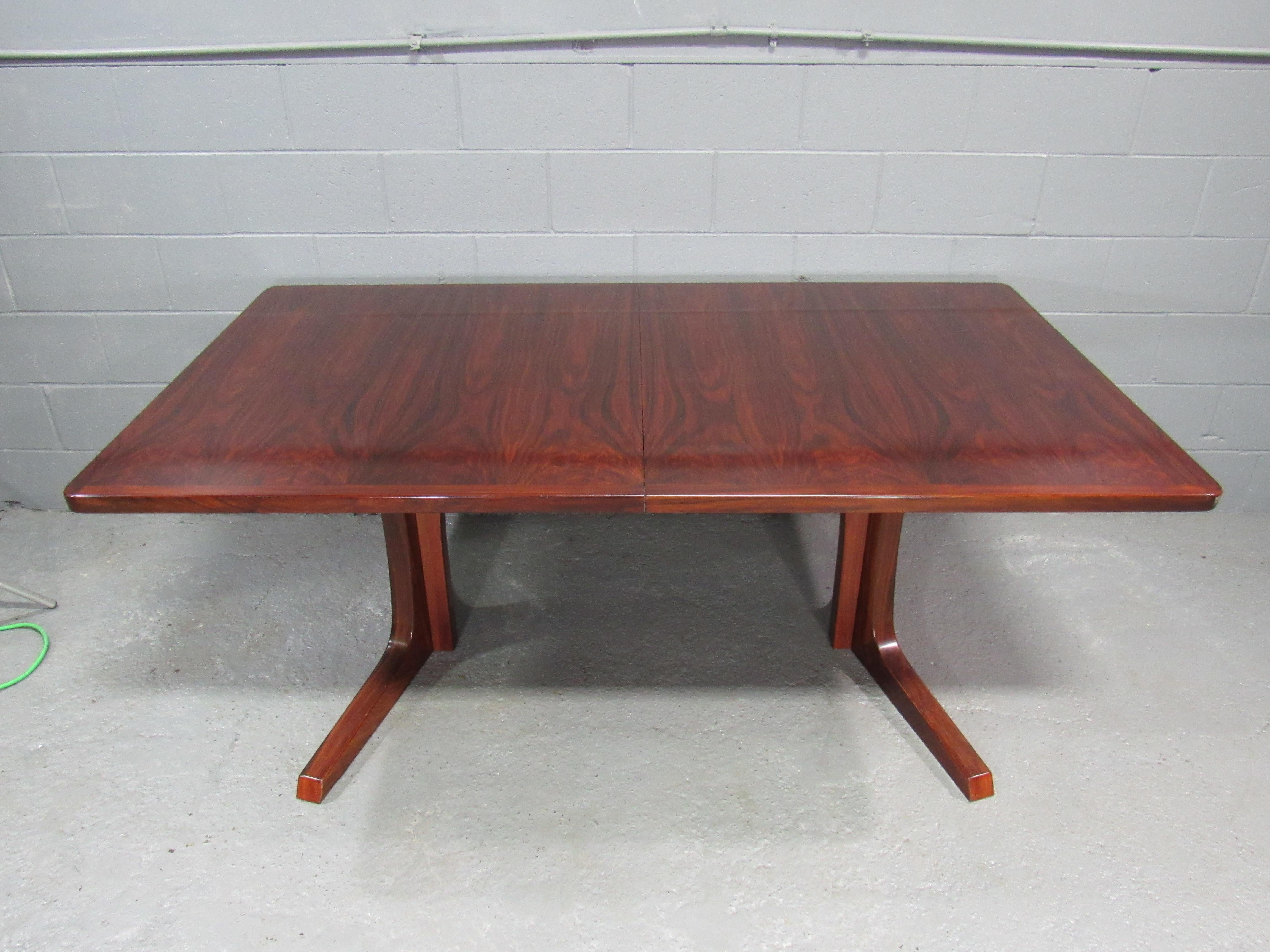 Mid-Century Danish Modern Rosewood Extension Dining Table by Gudme Mobelfabrik. Leaf self stores under table top.  One 19 1/4 in. leaf included.