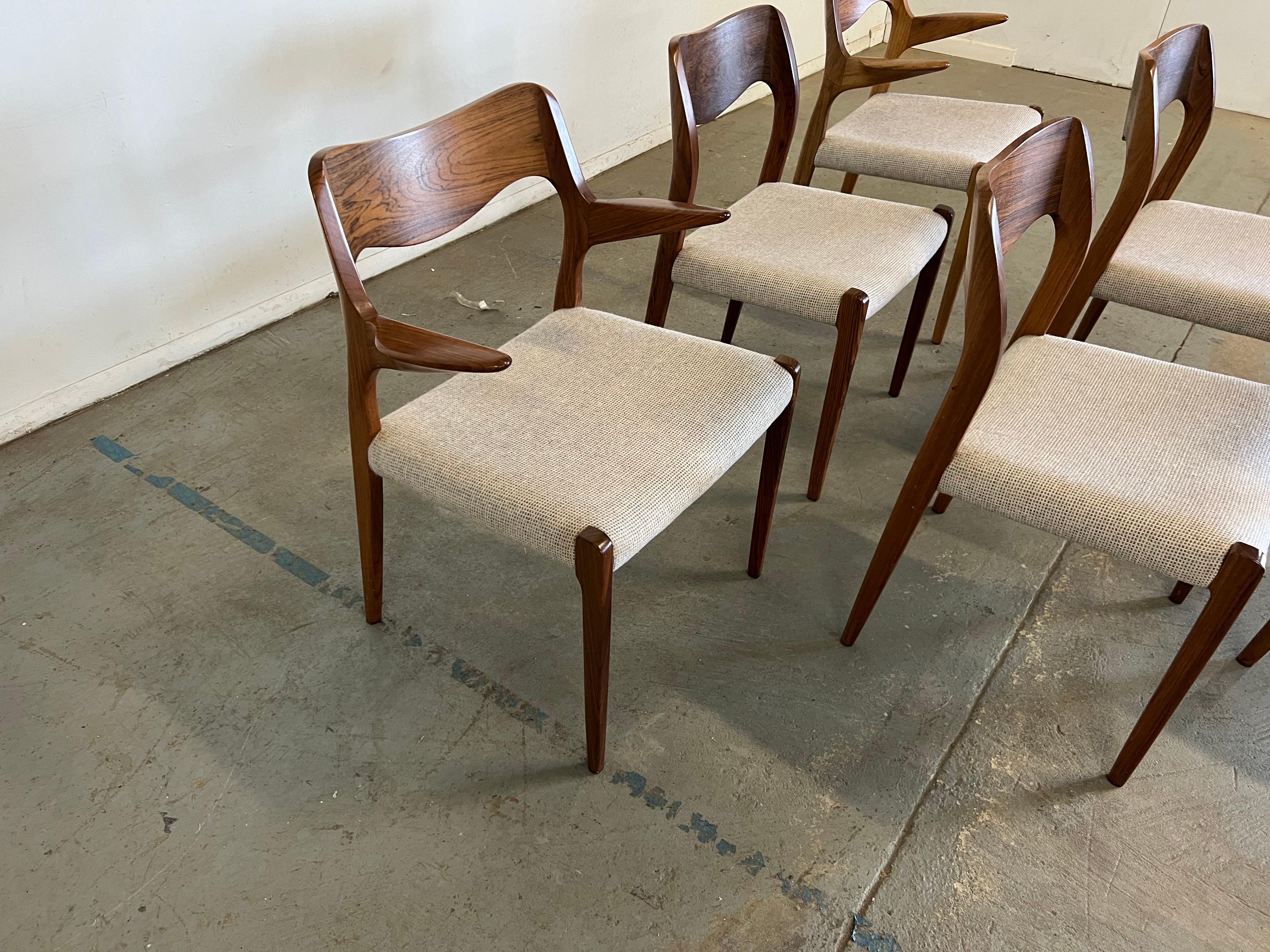 Mid-Century Danish Modern Rosewood Jl Mollers Model 71 Dining Chairs-Set of 6

Offered is a Set of 6 Mid-Century Danish Modern Rosewood Dining Chairs. The set has great lines and will make a great addition to any room. Includes 2 arm chairs and 4