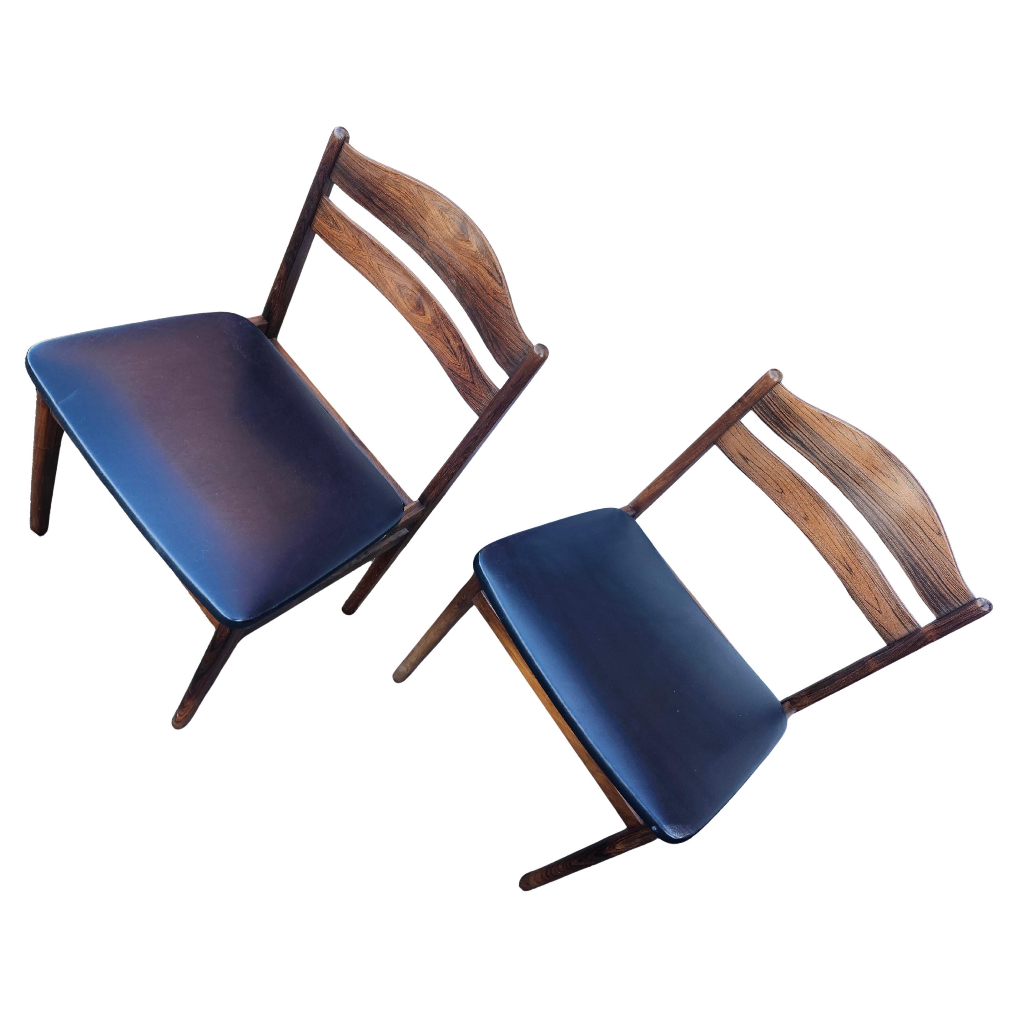 Fantastic simple yet elegant set of 8 danish modern rosewood dining chairs by BS Mobelfabrik of Denmark C1968. High quality and top comfort in their impeccable design and construction.  Stretchers surrond the legs and a soft curve to the slatted