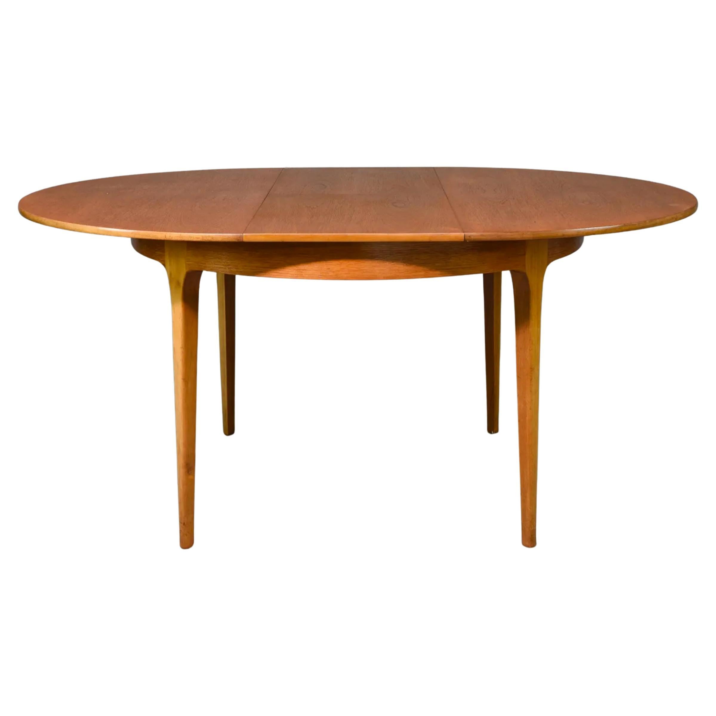 Scandinavian Modern Mid century Danish Modern round Teak dining table with (1) pop up leaf For Sale