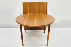 Mid-Century Danish Modern Round Teak Wood Dining Room Table with Two Leaves