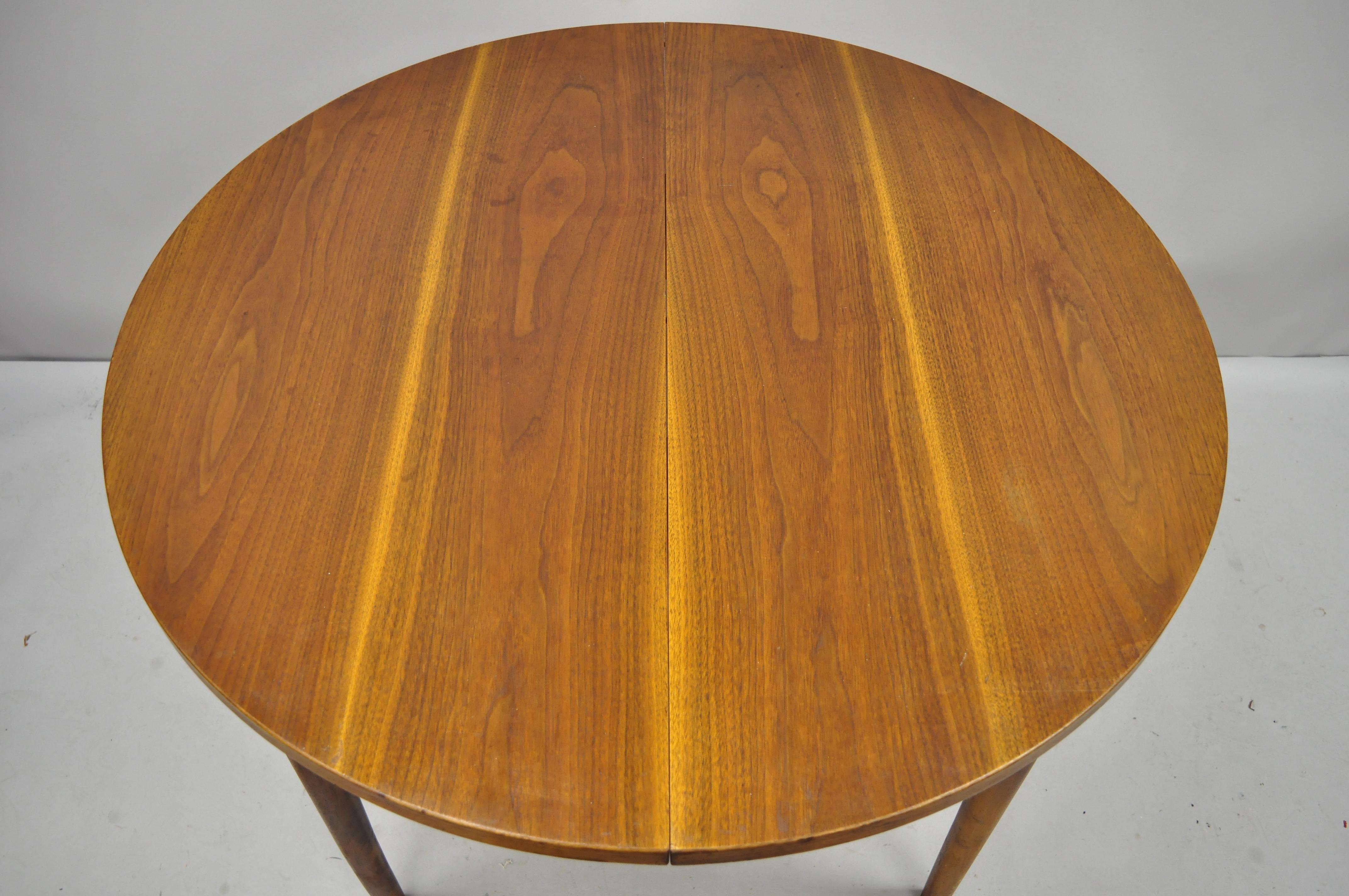 Mid-Century Modern Mid-Century Danish Modern Round Teak Wood Dining Room Table with Two Leaves