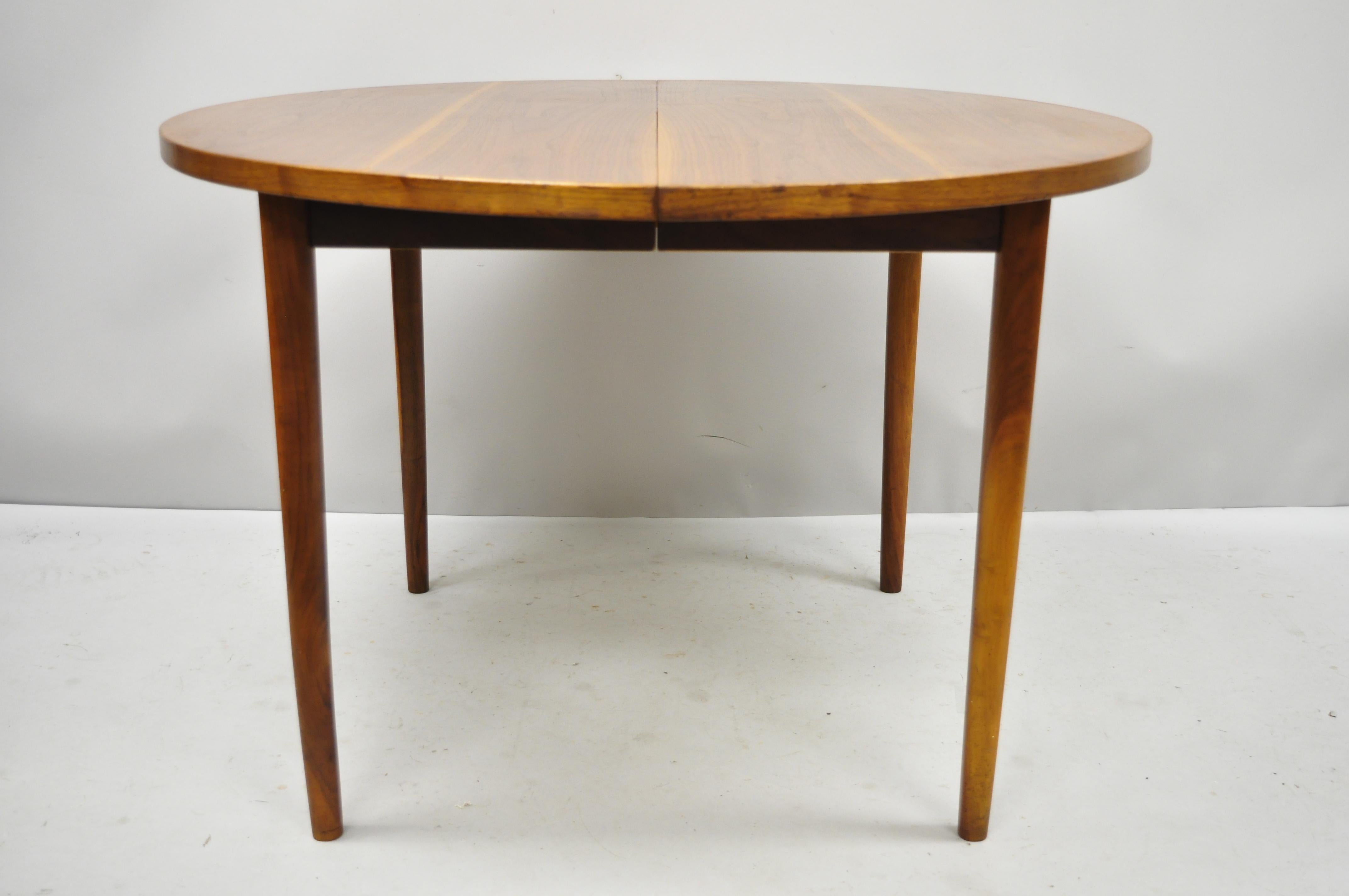 Mid-Century Danish Modern Round Teak Wood Dining Room Table with Two Leaves 4