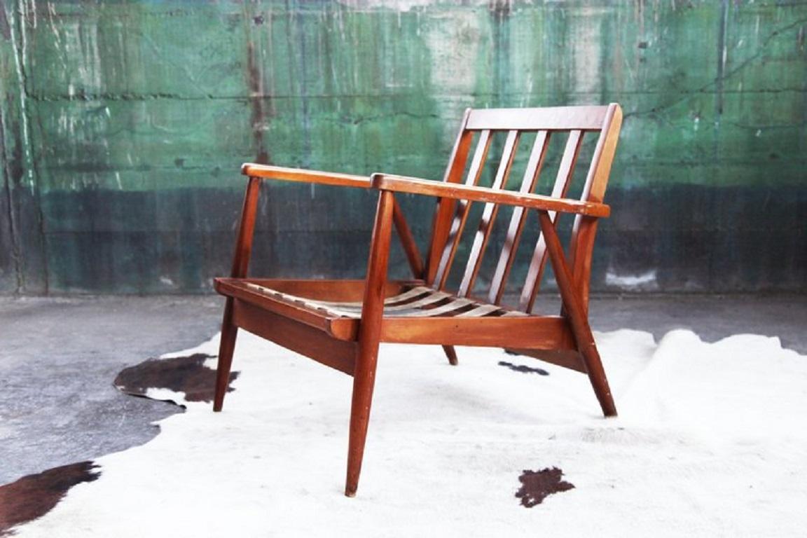 Beautiful Danish lounge chair, frame only.
Priced well below market value.

We recommend refinishing the frame and re-strapping the seat straps.

Re-strapping is often done by an upholsterer when they make cushions. You may also want to polish the