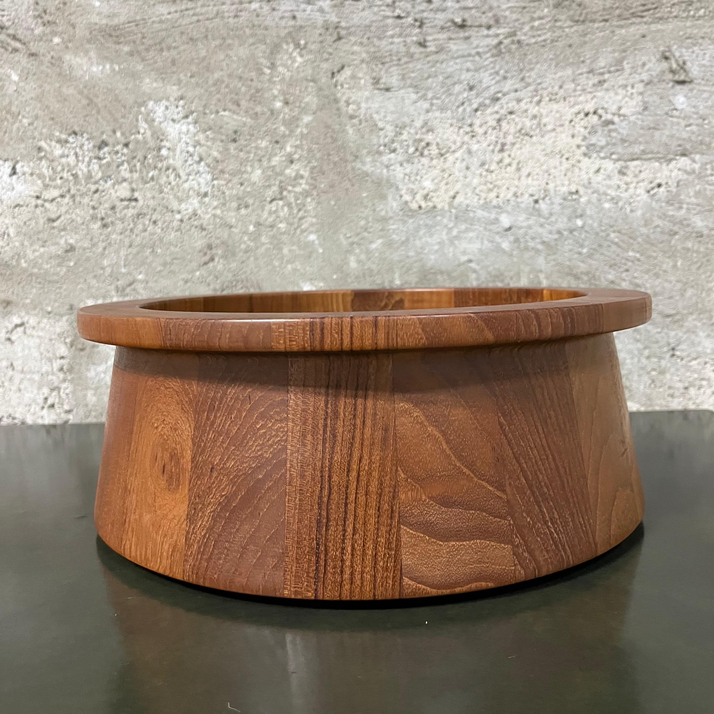Mid Century Danish Modern Teak Serving Bowl by Jens Quistgaard for Dansk. Circa 1970s 
Features a beautiful staved teak wood construction and a quintessential Mid Century Modern Scandinavian Design.
In excellent original condition with minor signs