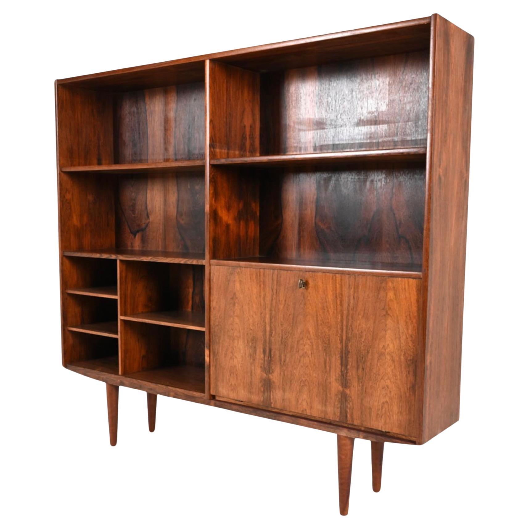 Mid Century Danish Modern Slim Rosewood Bookcase with Lower Bar Unit with Key For Sale