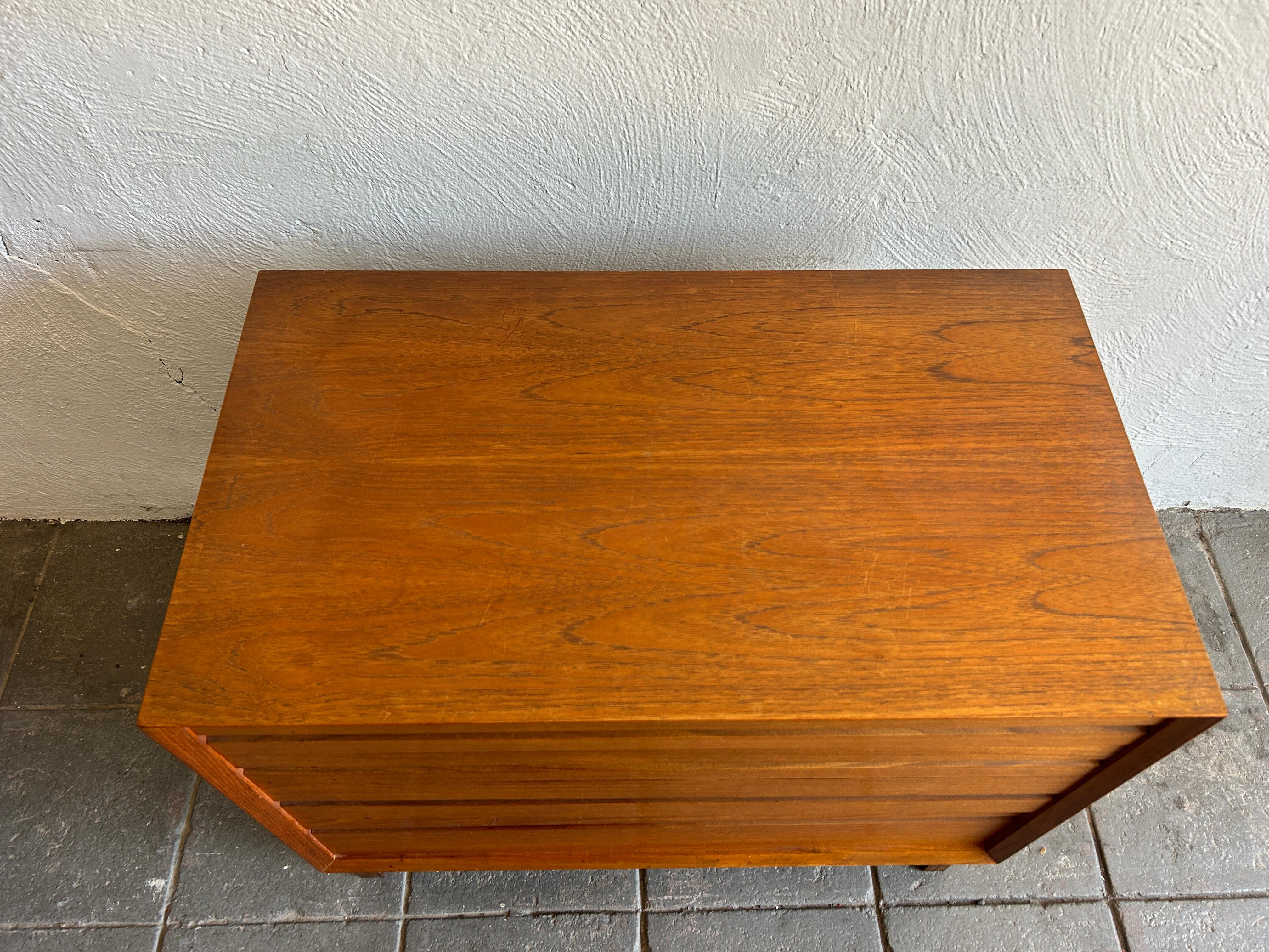 Danish Mid century danish modern small 4 drawer low teak dresser on base