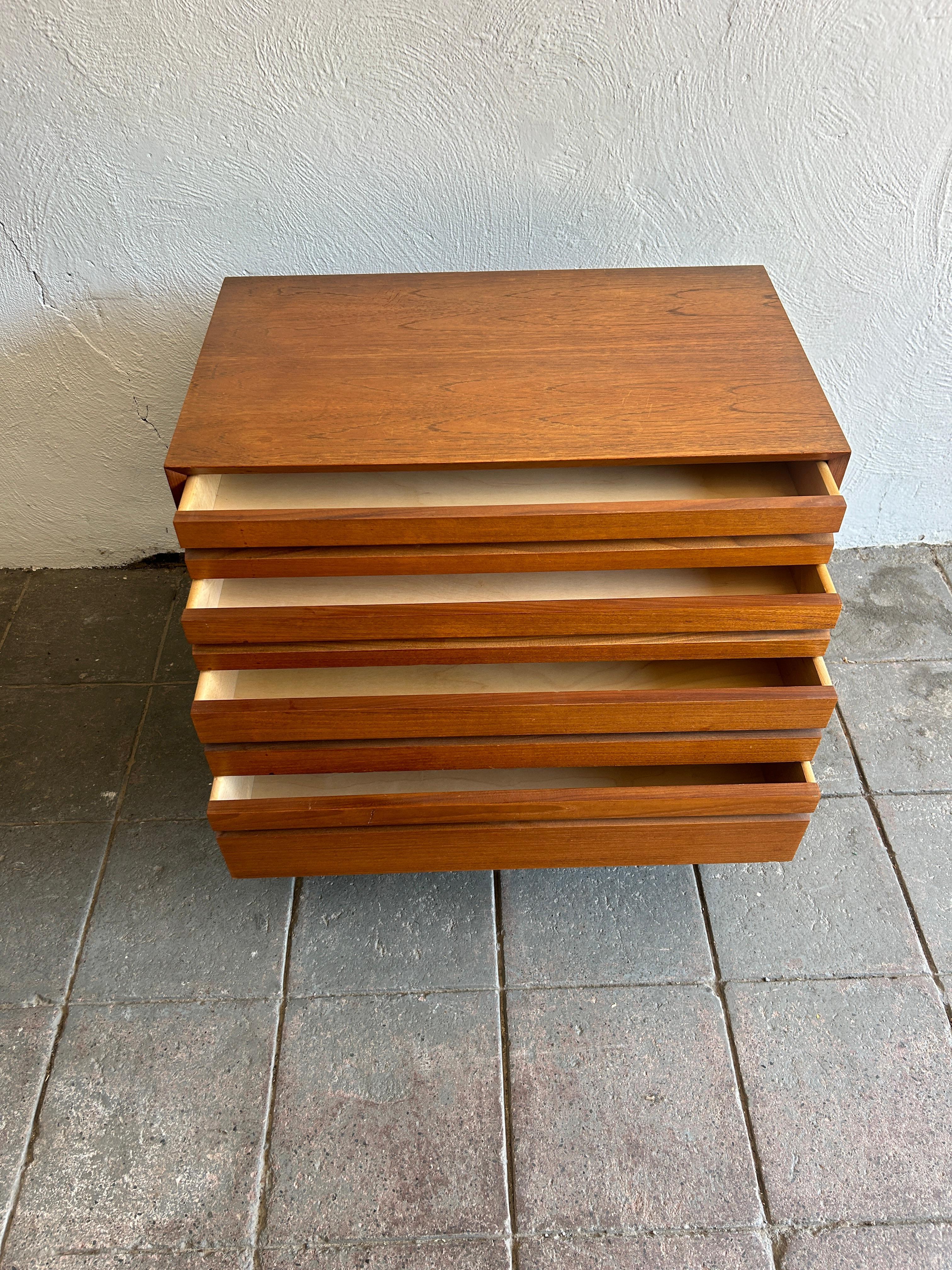 Mid-20th Century Mid century danish modern small 4 drawer low teak dresser on base