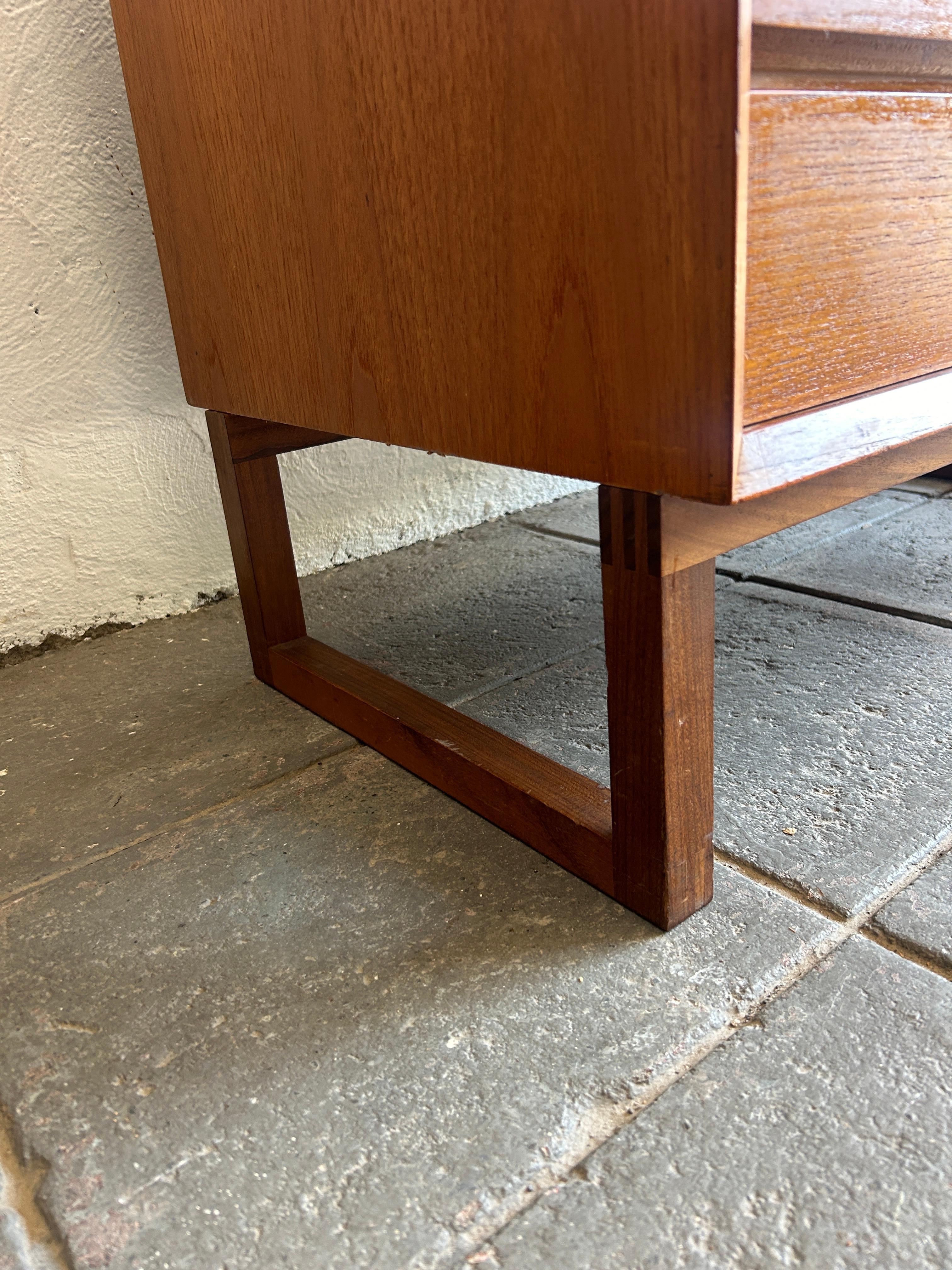 Mid century danish modern small 4 drawer low teak dresser on base 1