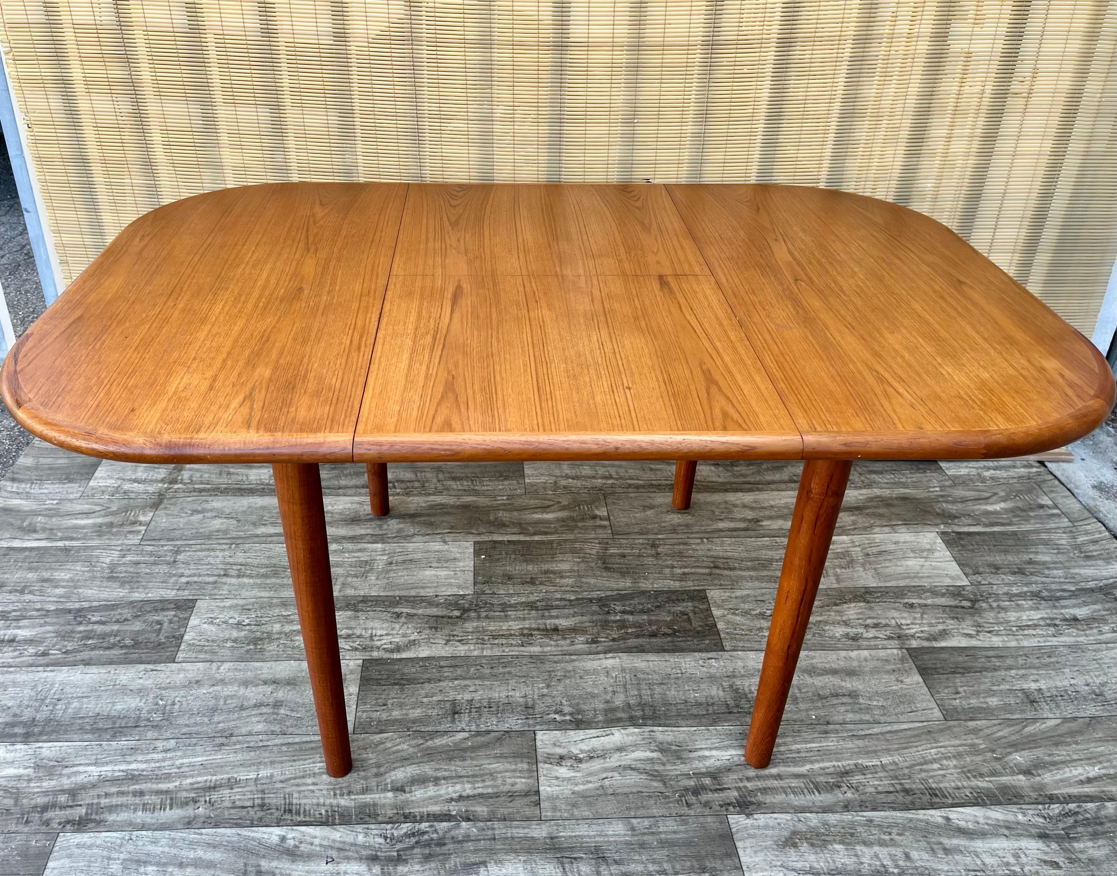 Mid Century Danish Modern Style Teak Extendable Dining Table. Circa 1970s 2